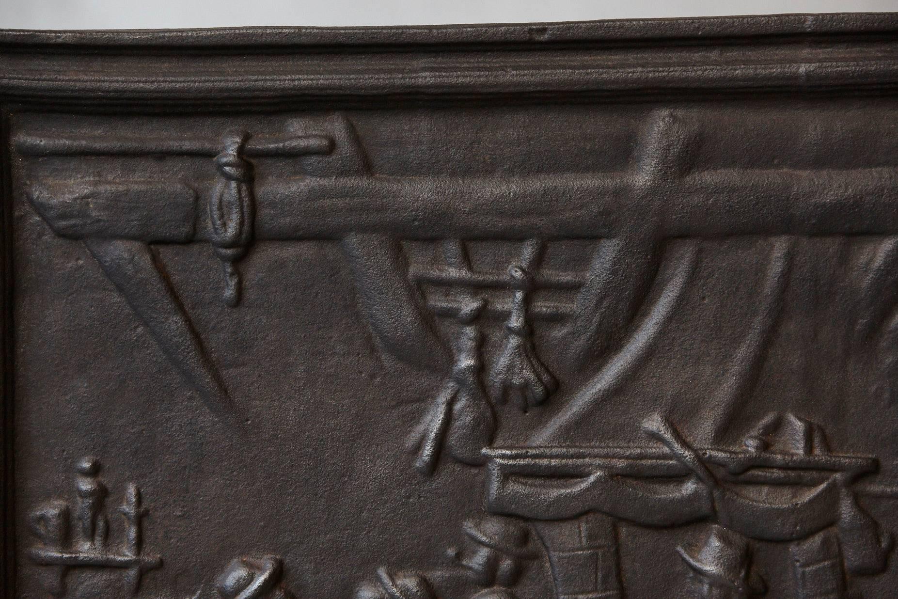 19th Century Black Iron Fireback Depicting a Scene in a Home 1