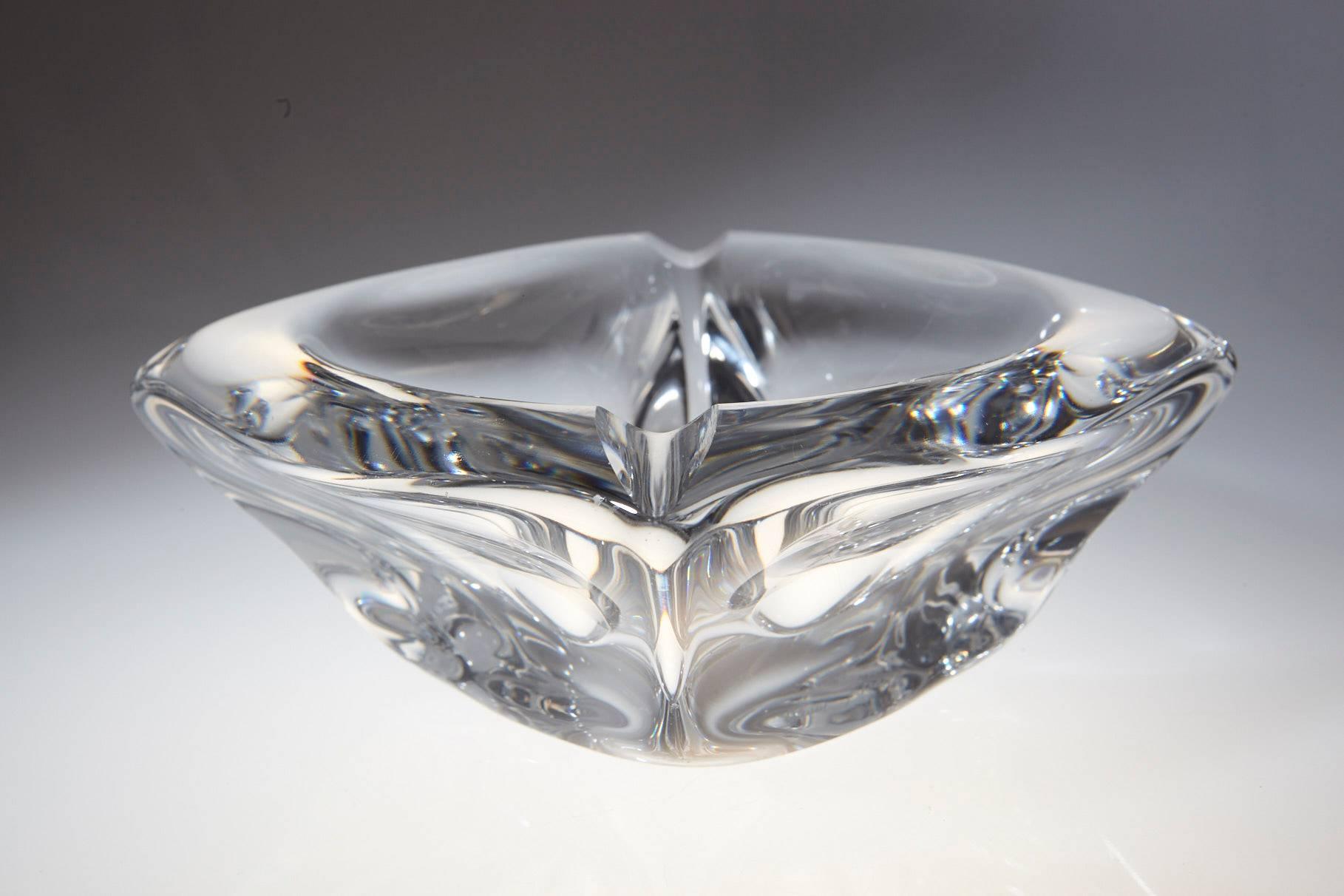 Impressive and heavy crystal ashtray signed by Daum France.
There is one tiny chip, please refer to the photo.