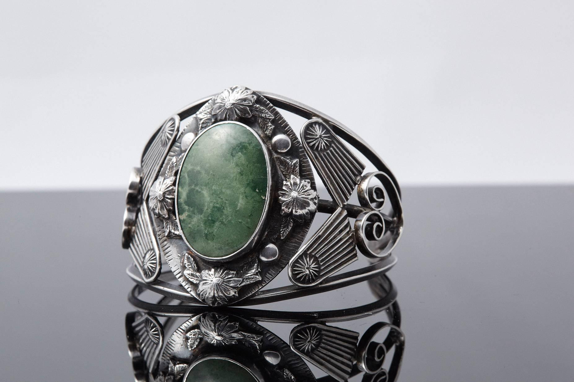 Sterling Cuff with Large Green Centre Turquoise and Elaborated Reliefs, 1940s 1