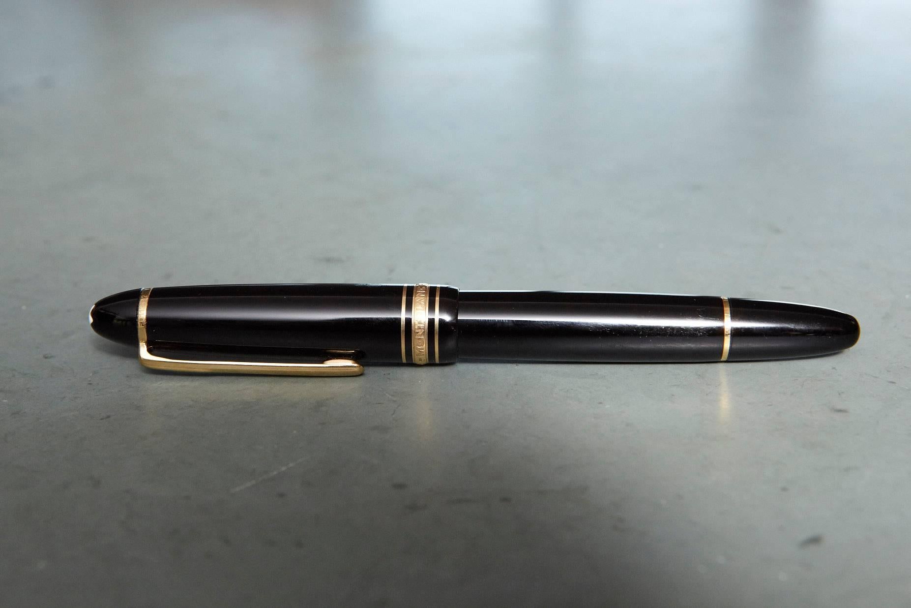 Montblanc Meisterstück fountain pen with an 18-karat gold nib, dating to, circa 1970. The gold cap ring is marked: Montblanc, Meisterstück, No. 146. The gold nib is marked with the Montblanc logo, 4810, 18-karat, Montblanc.
The pen is of black