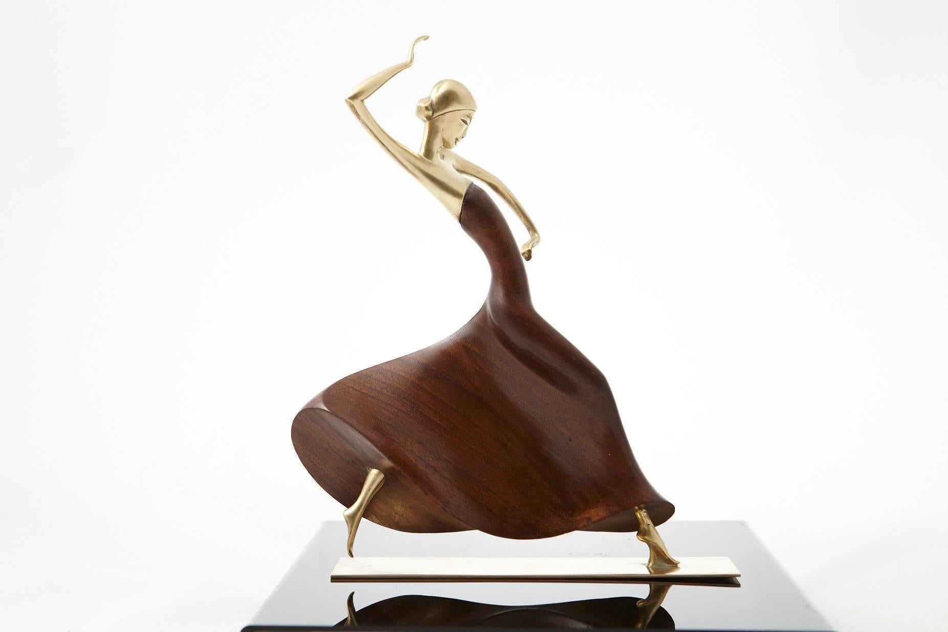 Exceptional Karl Hagenauer (Austrian, 1898-1956) handmade statue of a female dancer. hand-carved walnut and cast brass. Marked Handmade on the underside, Vienna, circa 1930s.
 