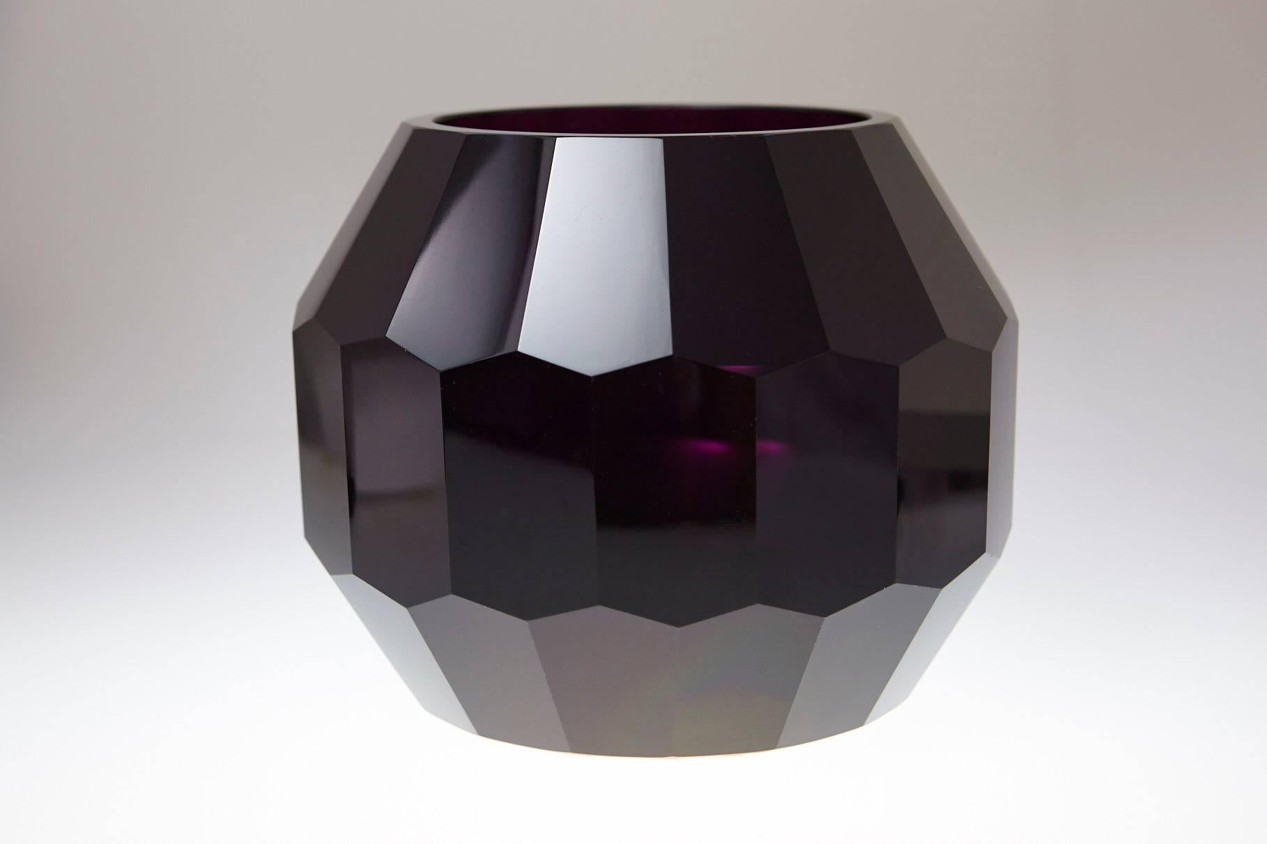 Beautiful large dark violet hand cut and hand polished crystal vase. The piece is unsigned but firmly attributed to Josef Hoffmann for Moser & Söhne, circa 1920s.
The vase is in very good condition, no chips or fleabites on the cut edges, no