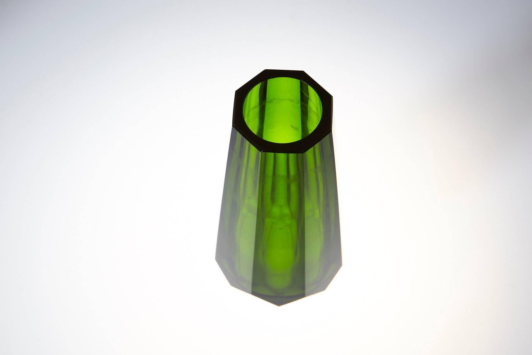Green hand cut and hand polished crystal vase. The piece is firmly attributed to Josef Hoffmann for Moser & Söhne, circa 1920s.
The vase is in good condition, no chips or fleabites on the cut edges, no repairs, some hard water stains on the inside