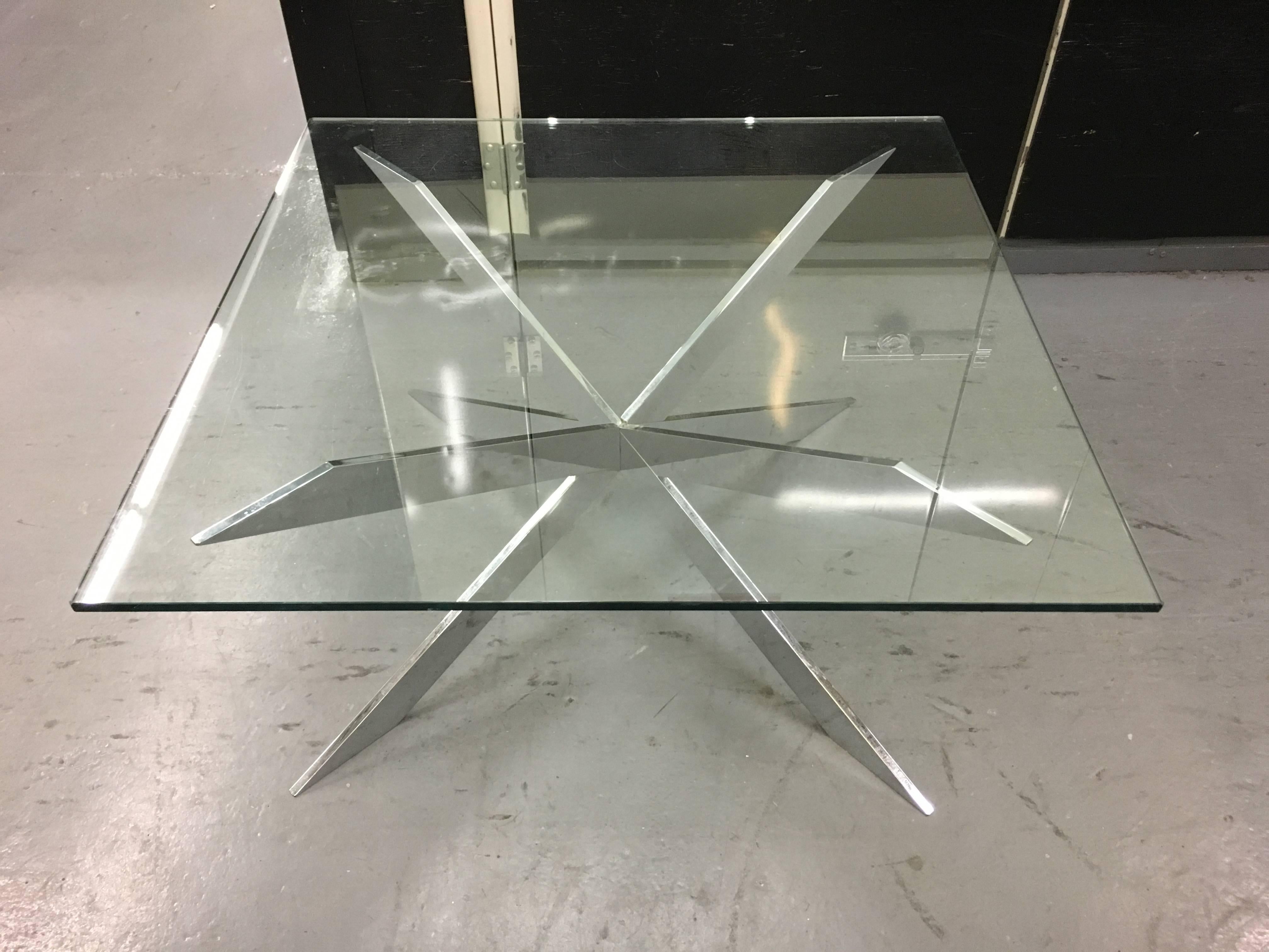 Square Pace cocktail table in heavy chrome and glass.