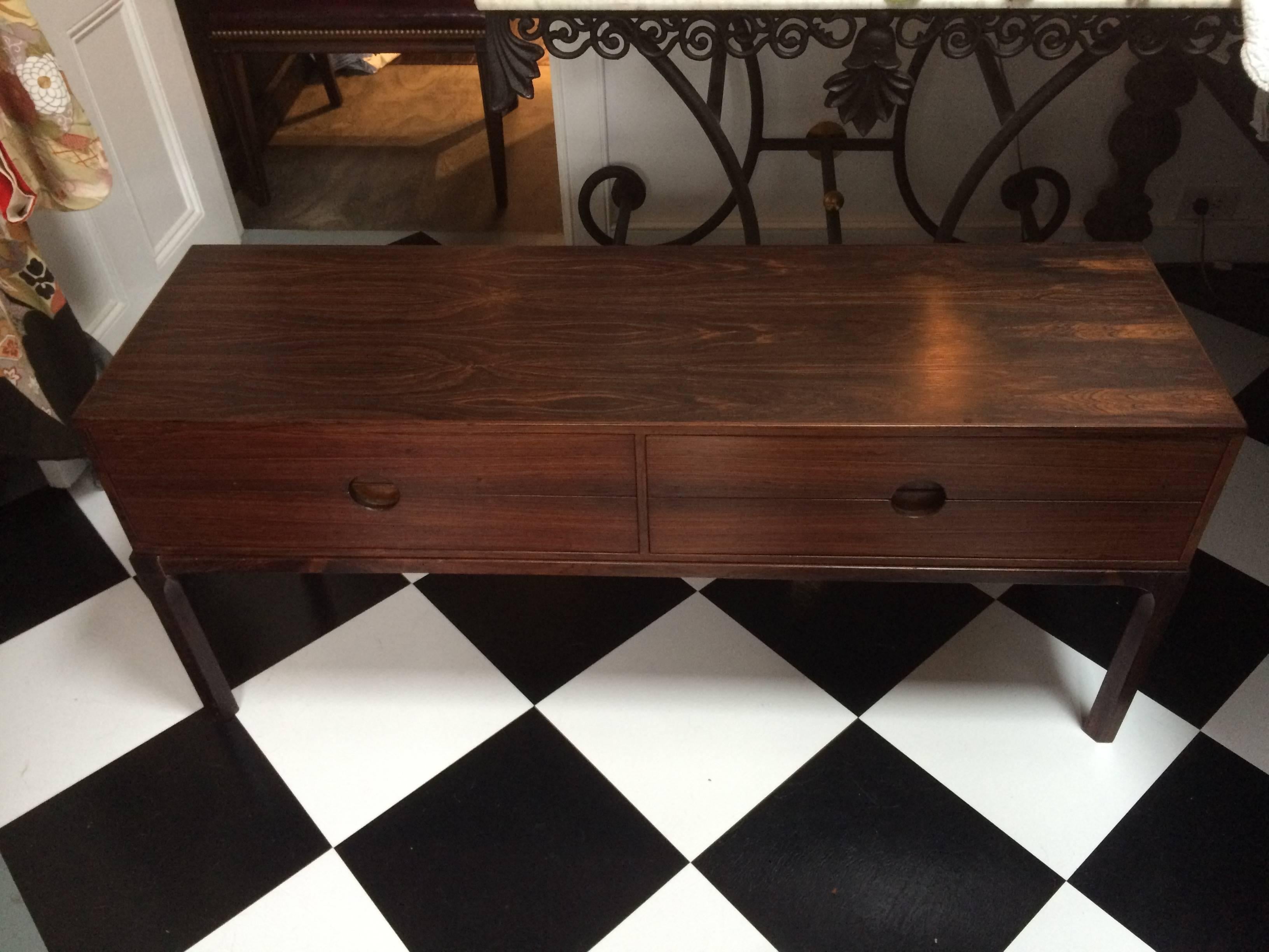 A lovely low console table with four drawers.