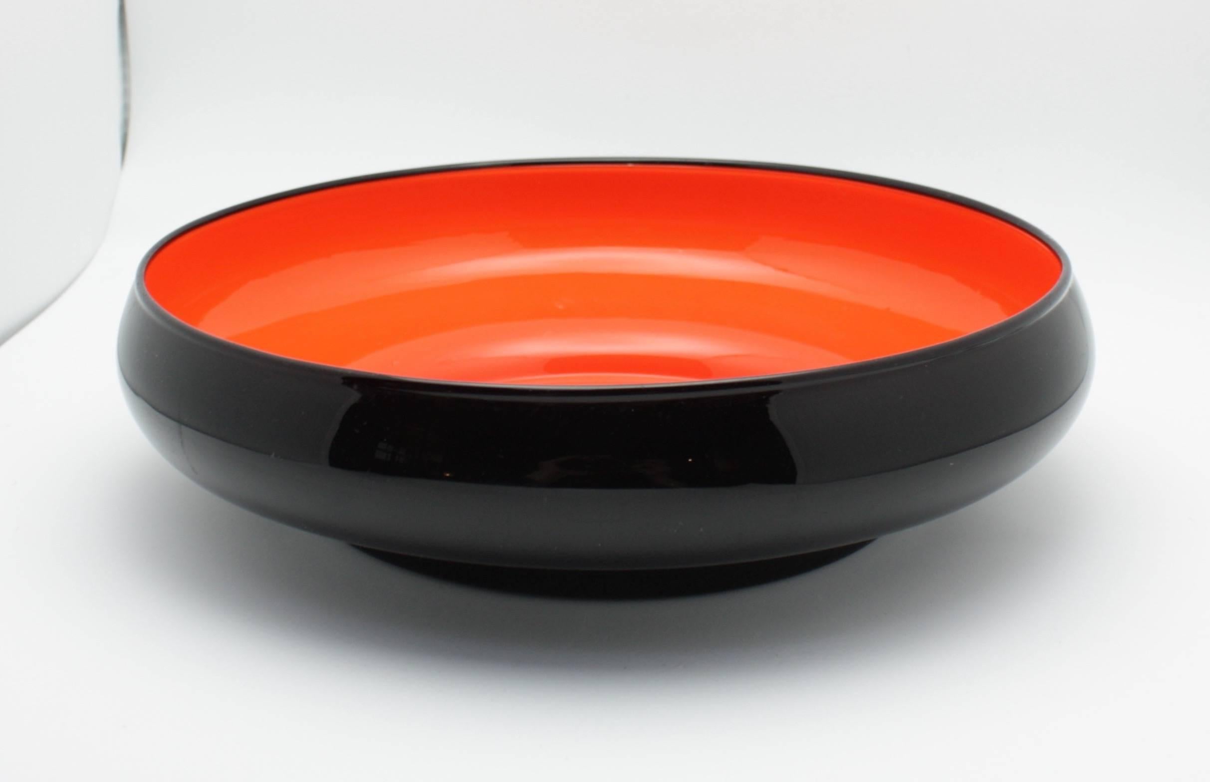 A dramatic Loetz Glass bowl. 
Michael Powolny (Austrian, 1871-1954), a Loetz bowl.
Solid black exterior with a bright orange interior.