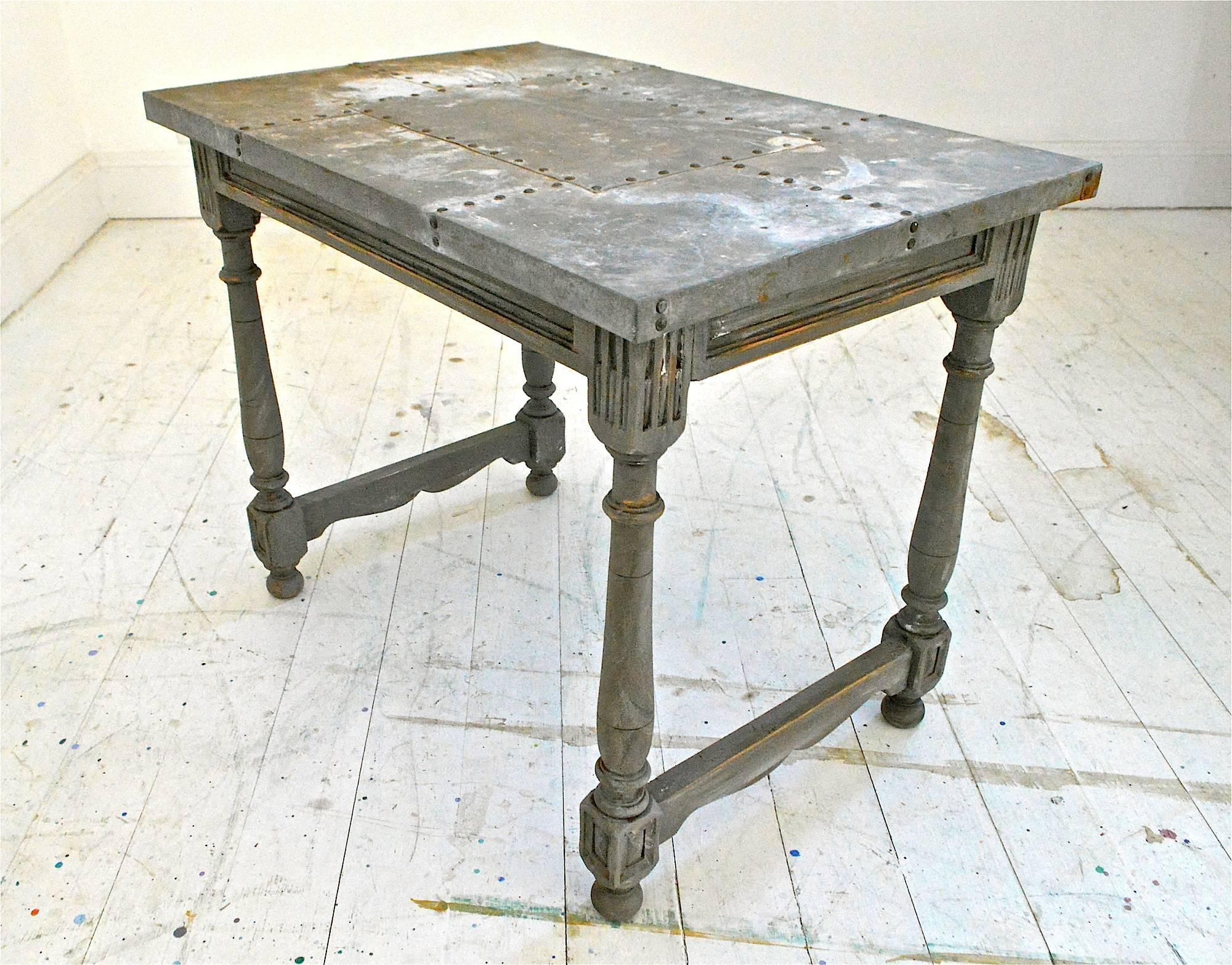 A handsome and useful zinc topped art studio stand / pedestal. Move it around your studio to house brushes and brush pots, paints and thinners as the galvanized top will last and last and become more worn and pretty with age and use.