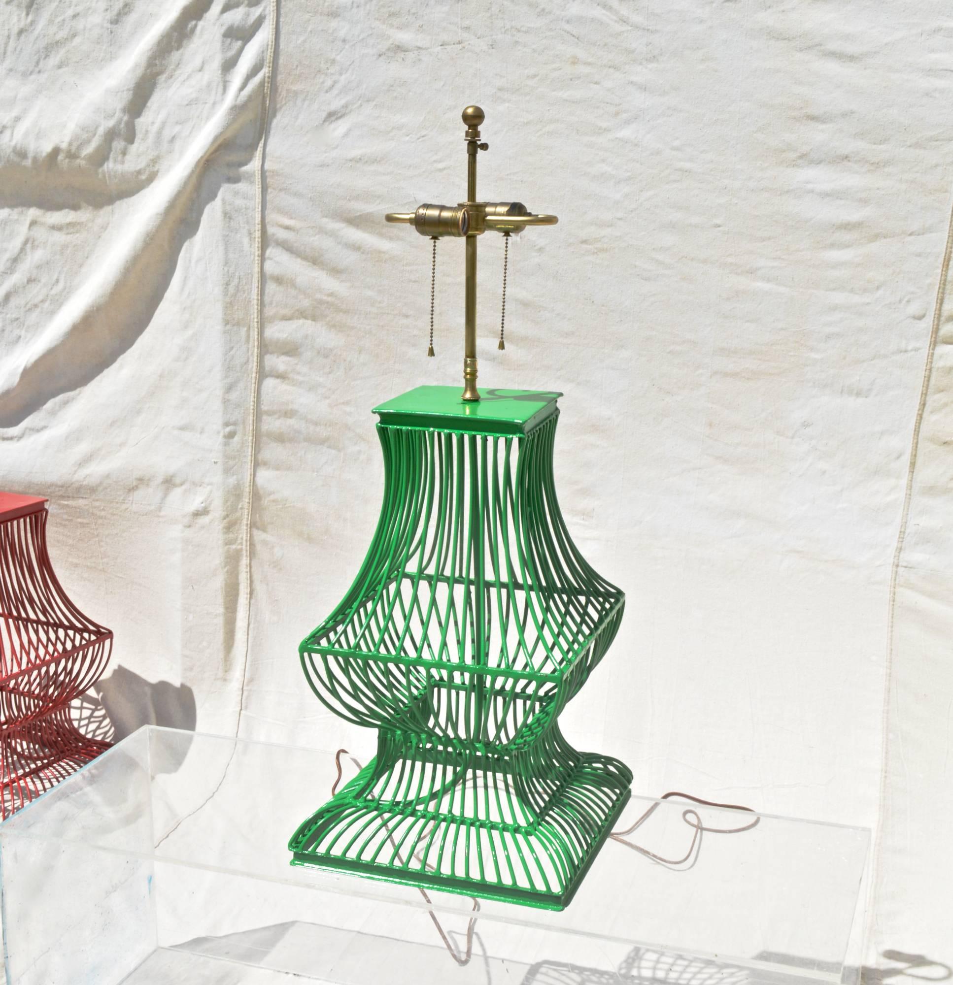 Metal birdcage form lamp of rather large scale. The industrial styled light is artisan made and was hand welded. Recent Spring green paint finish is of a soft gloss. Lamp has just been rewired and is outfitted with a high quality brass double socket