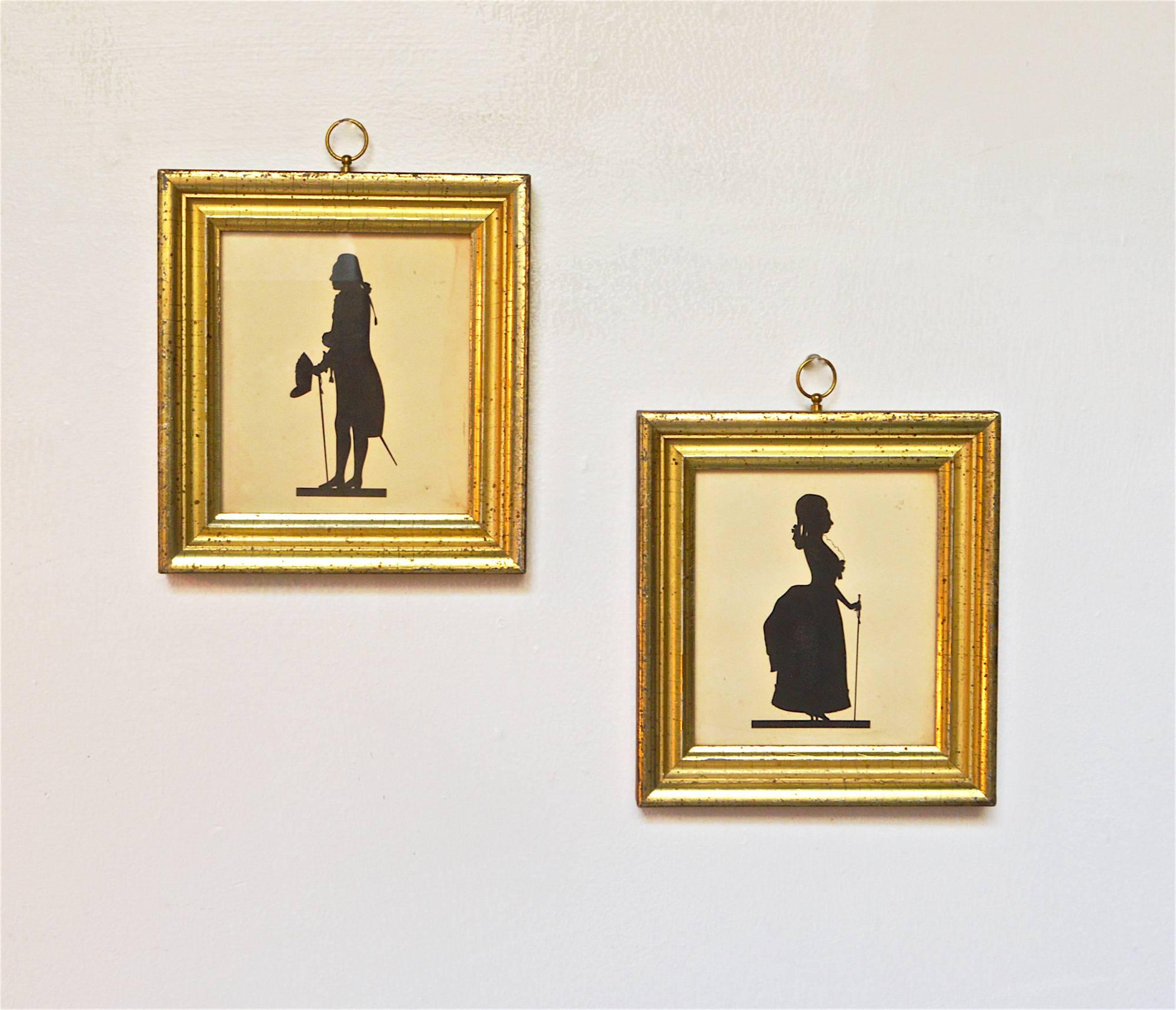 A pair of Silhouette's on gauche framed in gorgeous Borghese frames. The petite wall hangings possess a warmth and shimmer that only Borghese frames can produce. An Italian decorative arts firm, Borghese produced old world reproductions until World