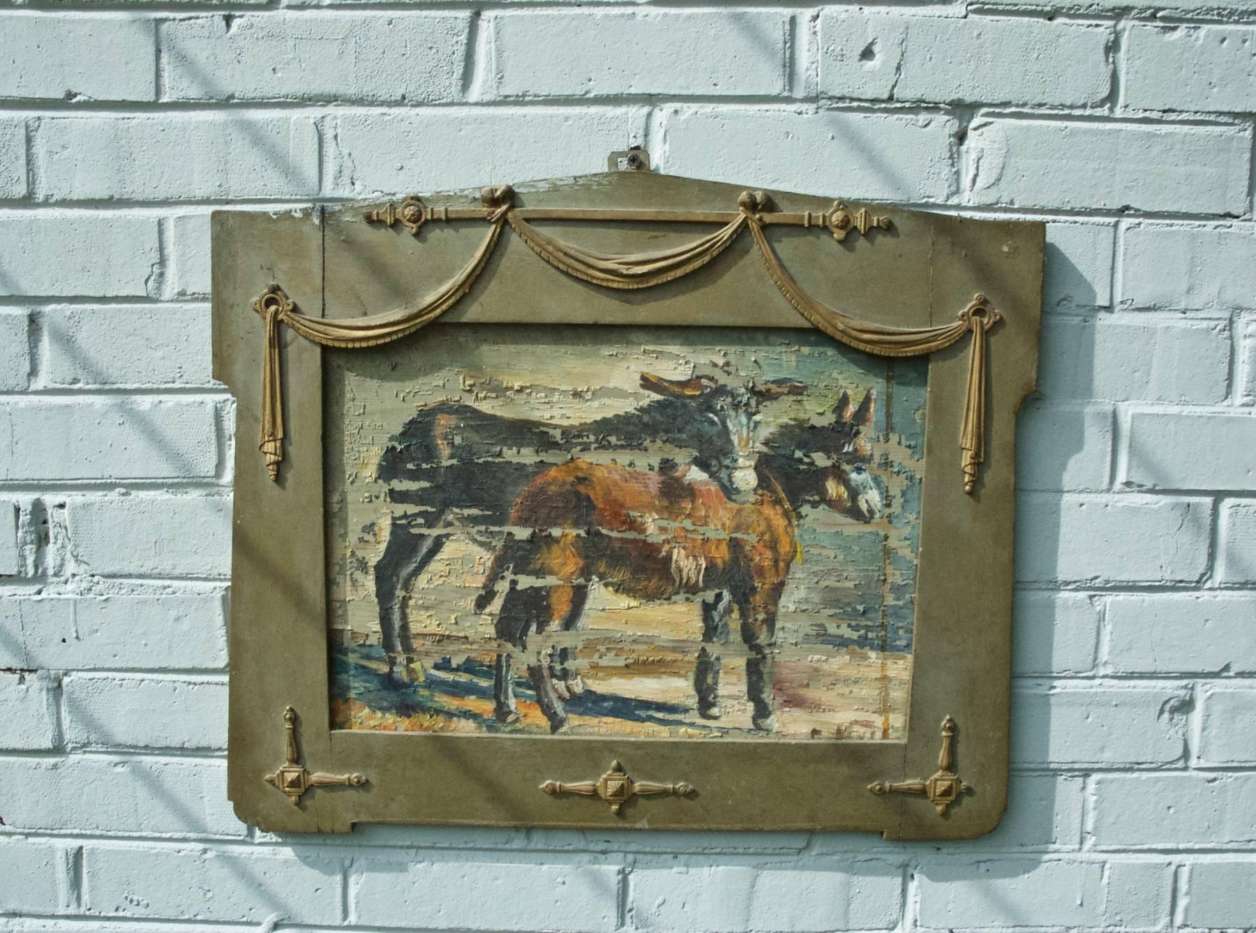 A rustic and funky painting of donkeys in the Folk Art style. Light heartedly painted on board and framed in what appears to be the door of a cabinet or such. Paint is flaking on the work and is being sold in as found condition. 

Board measures