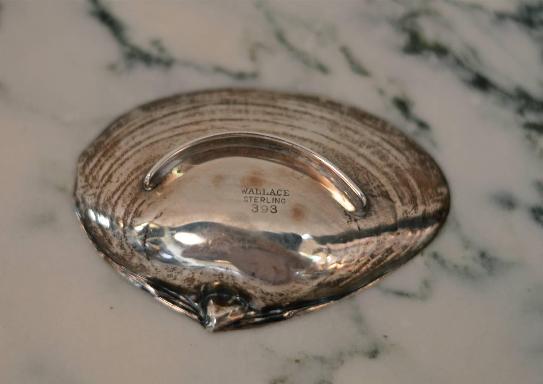 Sterling silver jewelry dish of clam shell form by R. Wallace & Sons, Wallingford CT. This is a spectacular little gem.
    