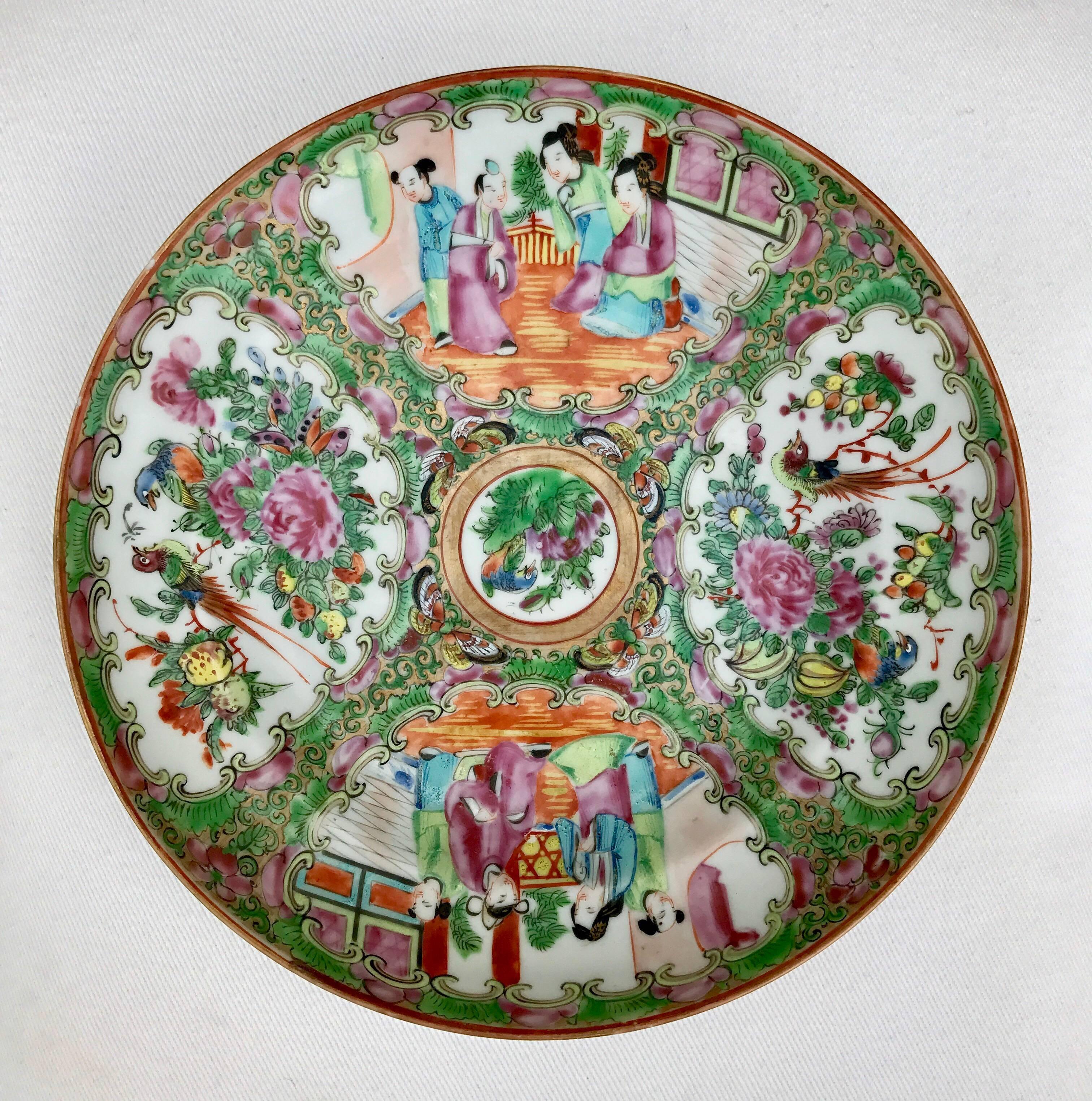 A mid 20th Century Rose Mandarin style dish depicting happy couples courting, springtime in full bloom and life is rich and full of color. The hand painted saucer makes an excellent candy dish for that special treat. The four paneled decorative bowl