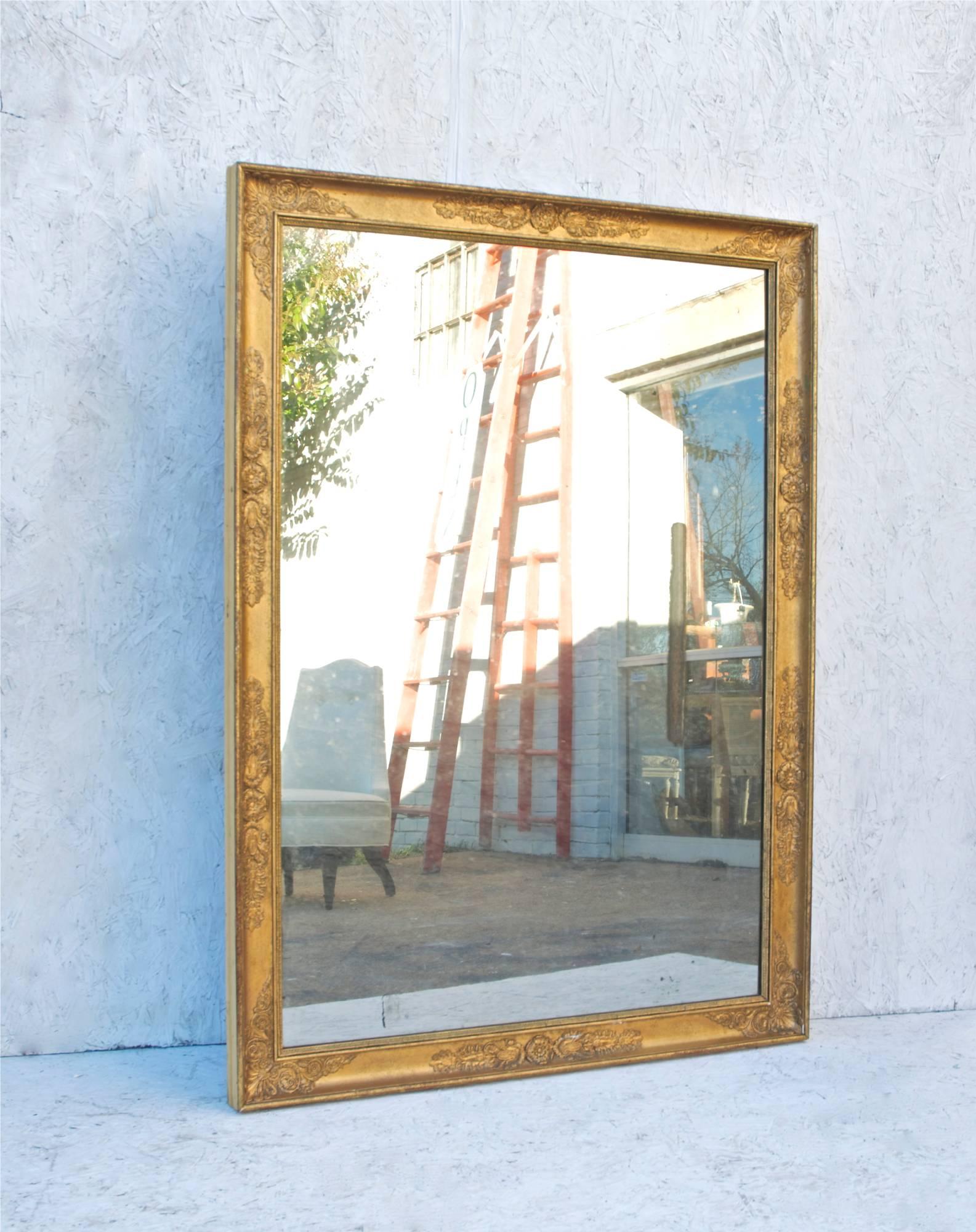 19th century French mirror of a fairly grand scale. This simple rectangular framed, panel backed mirror was more than likely purchased in France, circa 1852-1853 by then U.S. Ambassador to France , William Cabell Rives. The mirror has just been