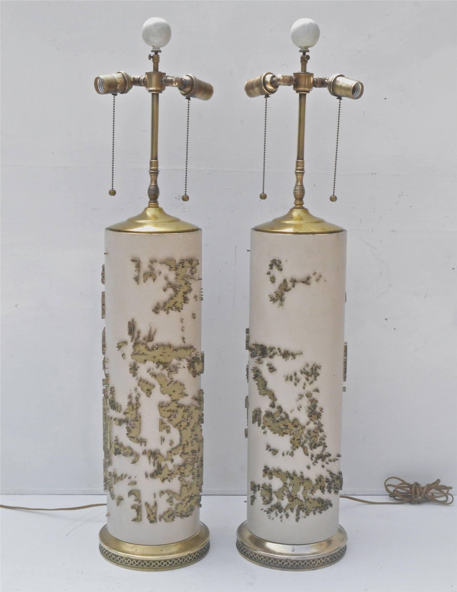 Large-scale and epic pair of wallpaper roller lamps, circa 1940s. The cylinders are very substantial as they are constructed of solid hardwood and give this pair of lamps real heft and a superb feel. The vintage bases and vase caps show a natural