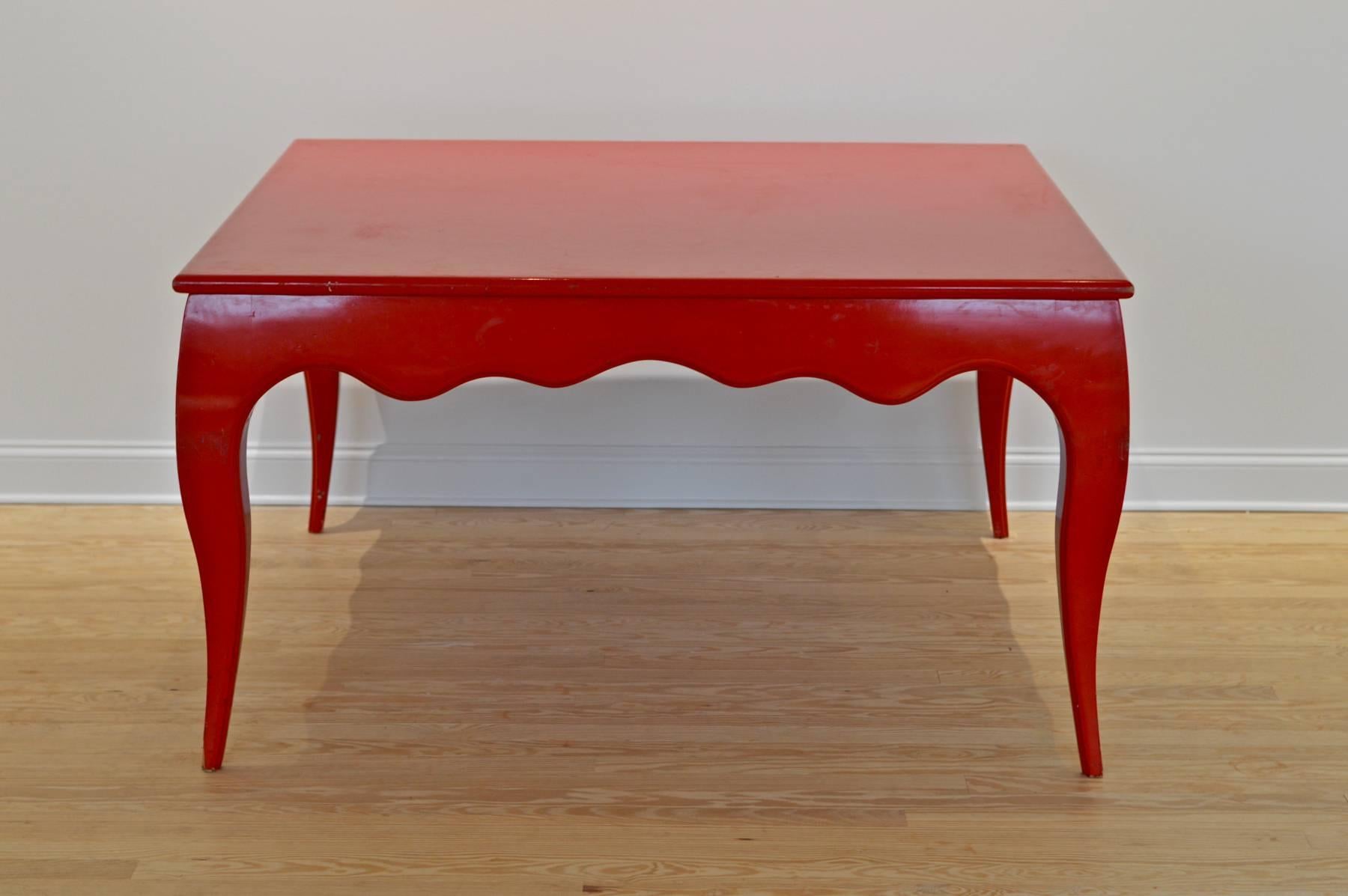 An unusual square dining table having chunky cabriole legs and a vibrant red lacquer finish. The table supplies ample seating for eight. This table brings the drama.

Please contact us for additional photo's, shipping info by region or anything else