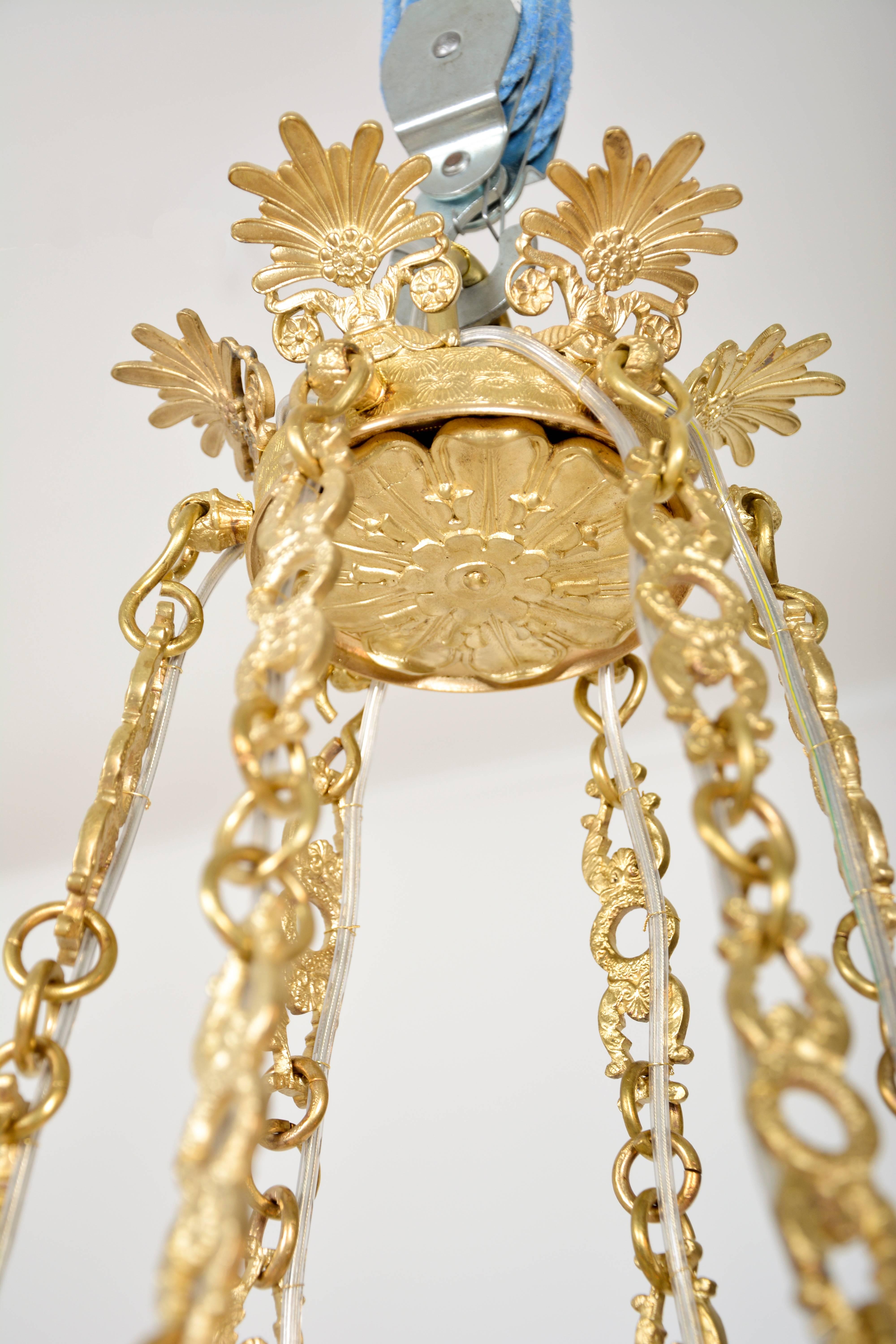 Empire Chandelier with cut glass and gilded cast brass frame For Sale 1