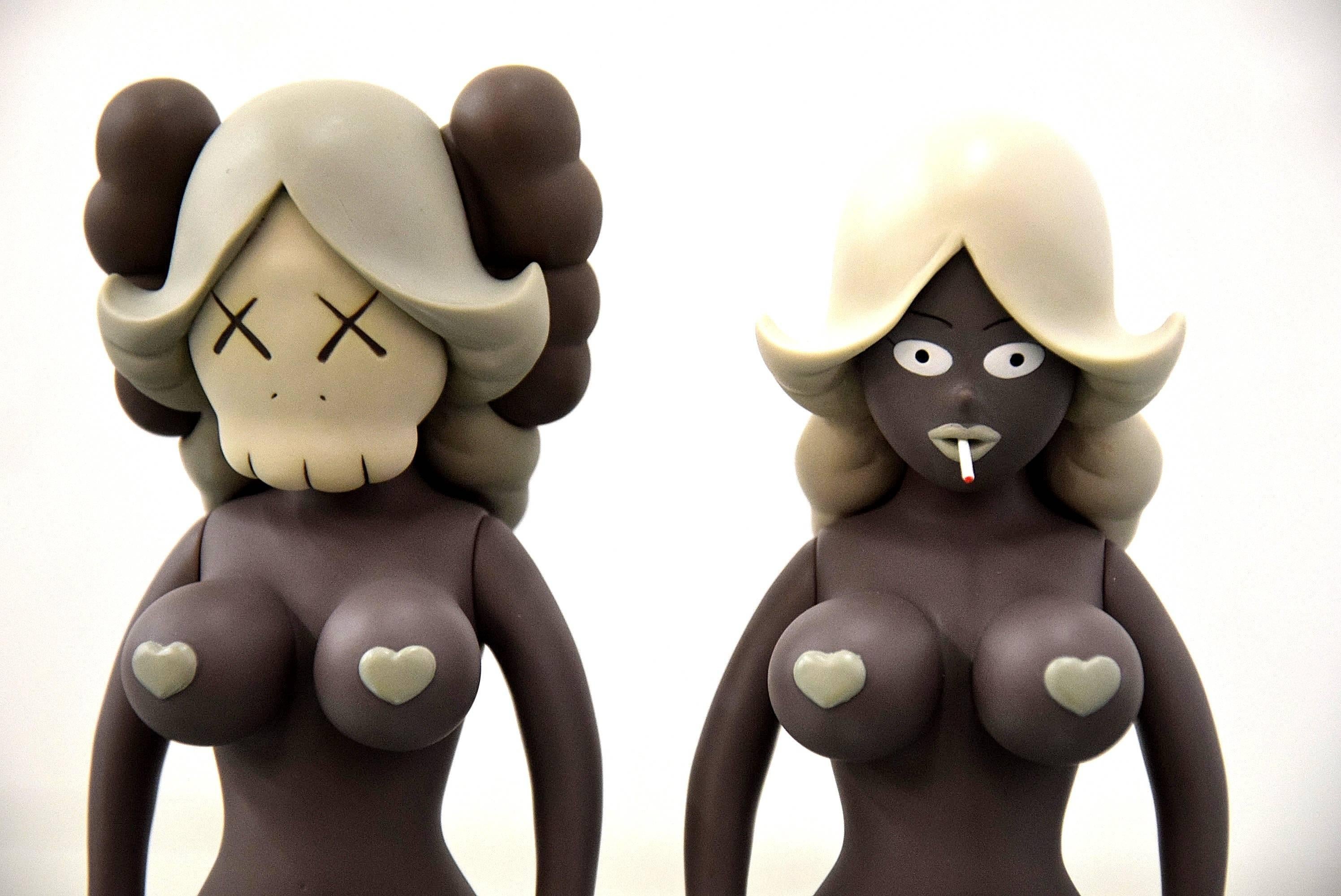 A collaboration between brooklyn-based artist, KAWS and graffiti artist, Todd James (REAS), this set of figures feature the unique stylings of each artist in a neutral, tonal palette.

Twins have never been exposed and have always been stored out