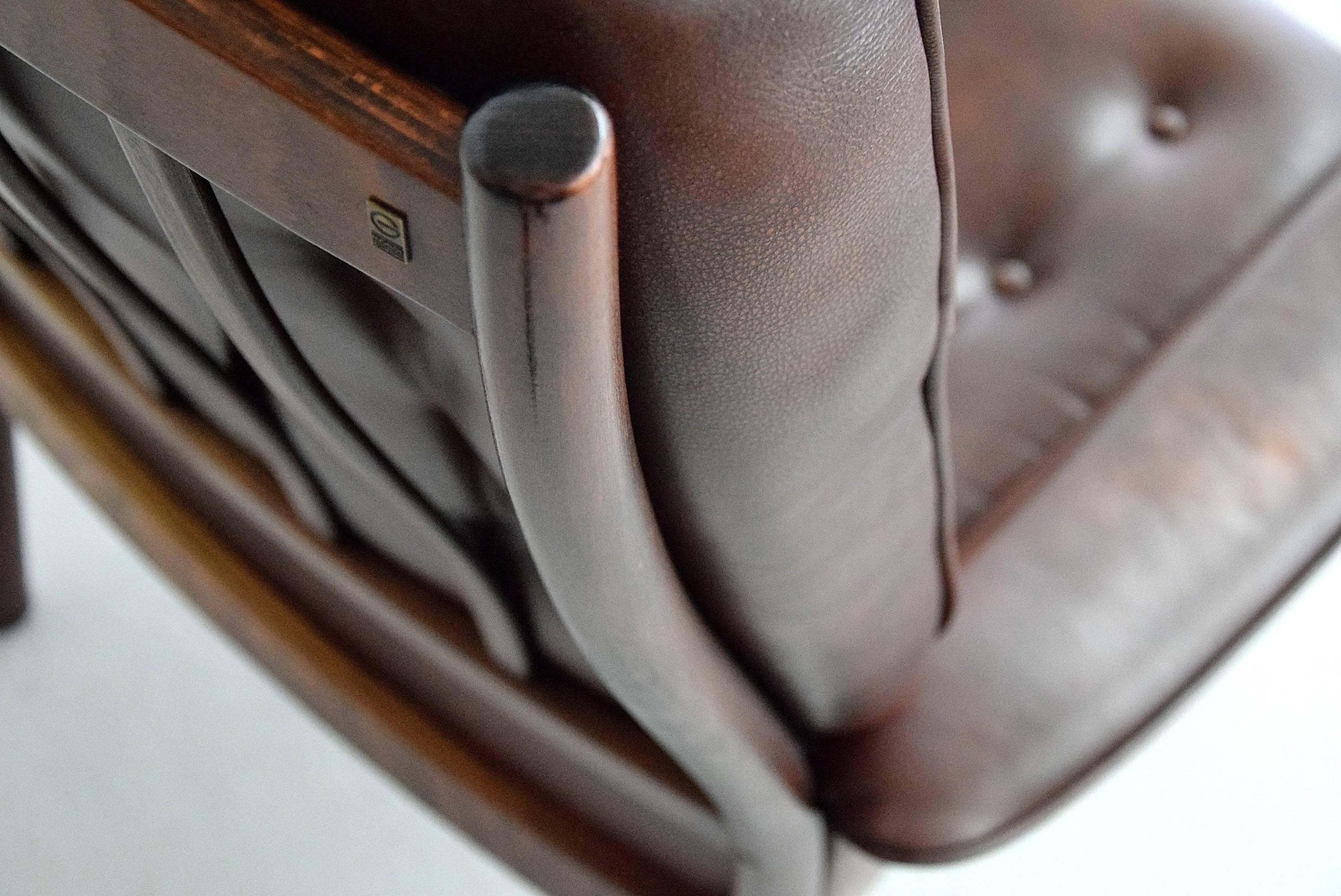 Extremely comfortable brown leather lounge chair produced by the Swedish furniture maker G-Mobel in the 1970s.

The chair is in great condition. Made of stained beechwood and with a beautiful patina on the leather.

Measurements: H 110 x W 81 x