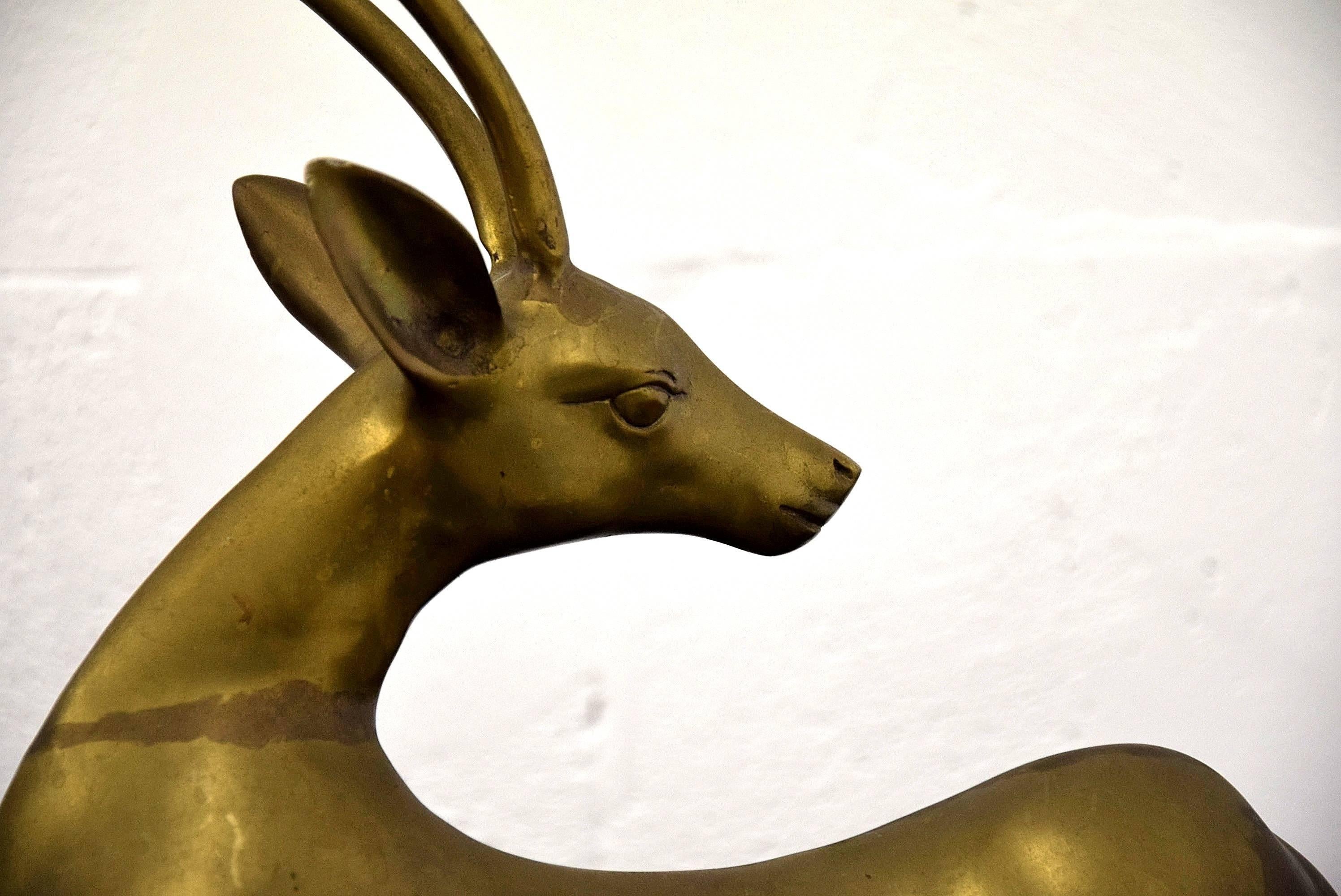 Beautiful 1960s French antelope sculpture very much in the style of Maison Jansen.

Maison Jansen (House of Jansen) was a Paris-based interior decoration office founded in 1880 by Dutch-born Jean-Henri Jansen. Jansen is considered the first truly