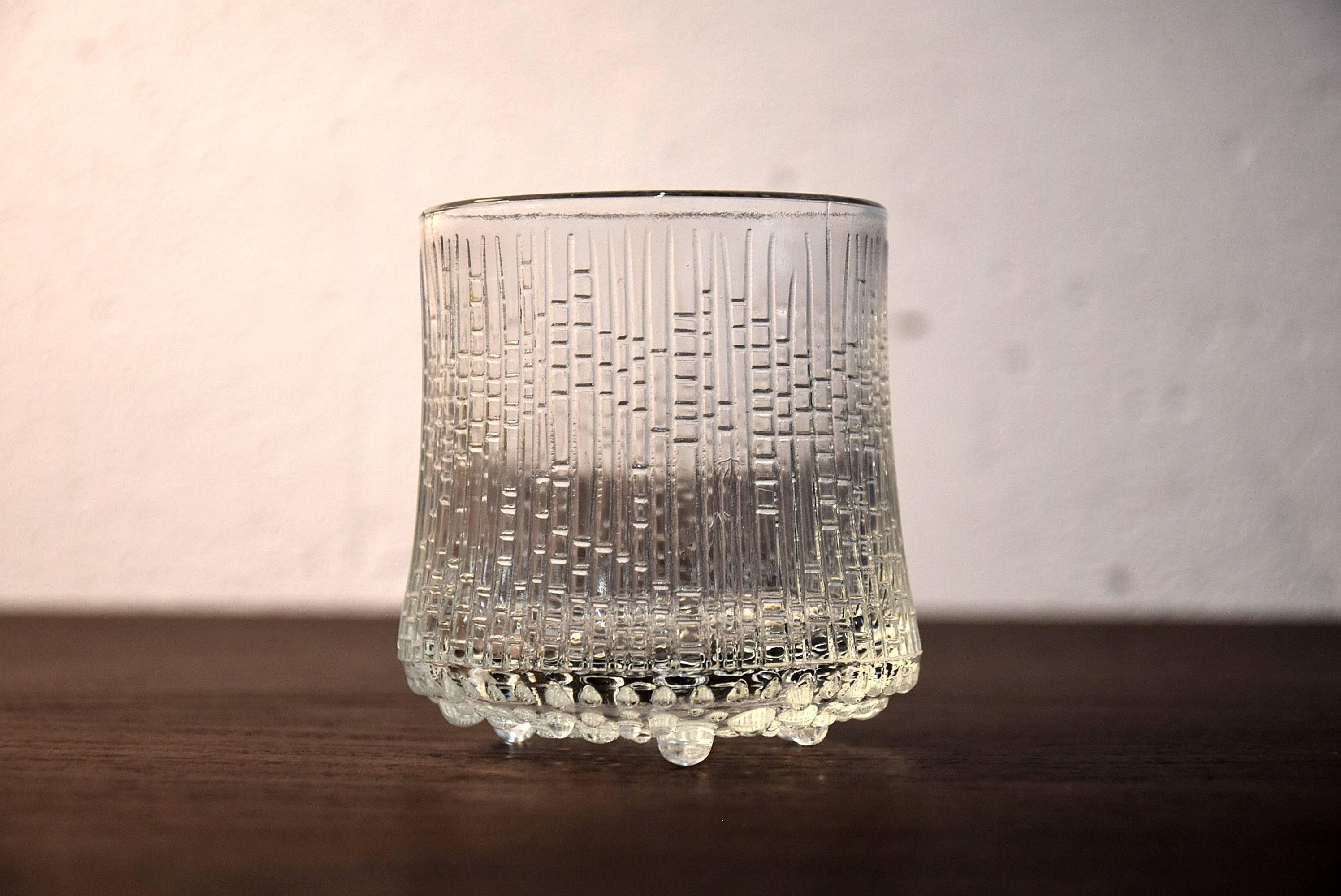 Ultima Thule 1960's Whiskey Glasses by Tapio Wirkkala in perfect condition.

Inspired by the melting ice in Lapland, Wirkkala originally created the surface of Ultima Thule in the 1960s after carving into a graphic mould. An Exclusive Design