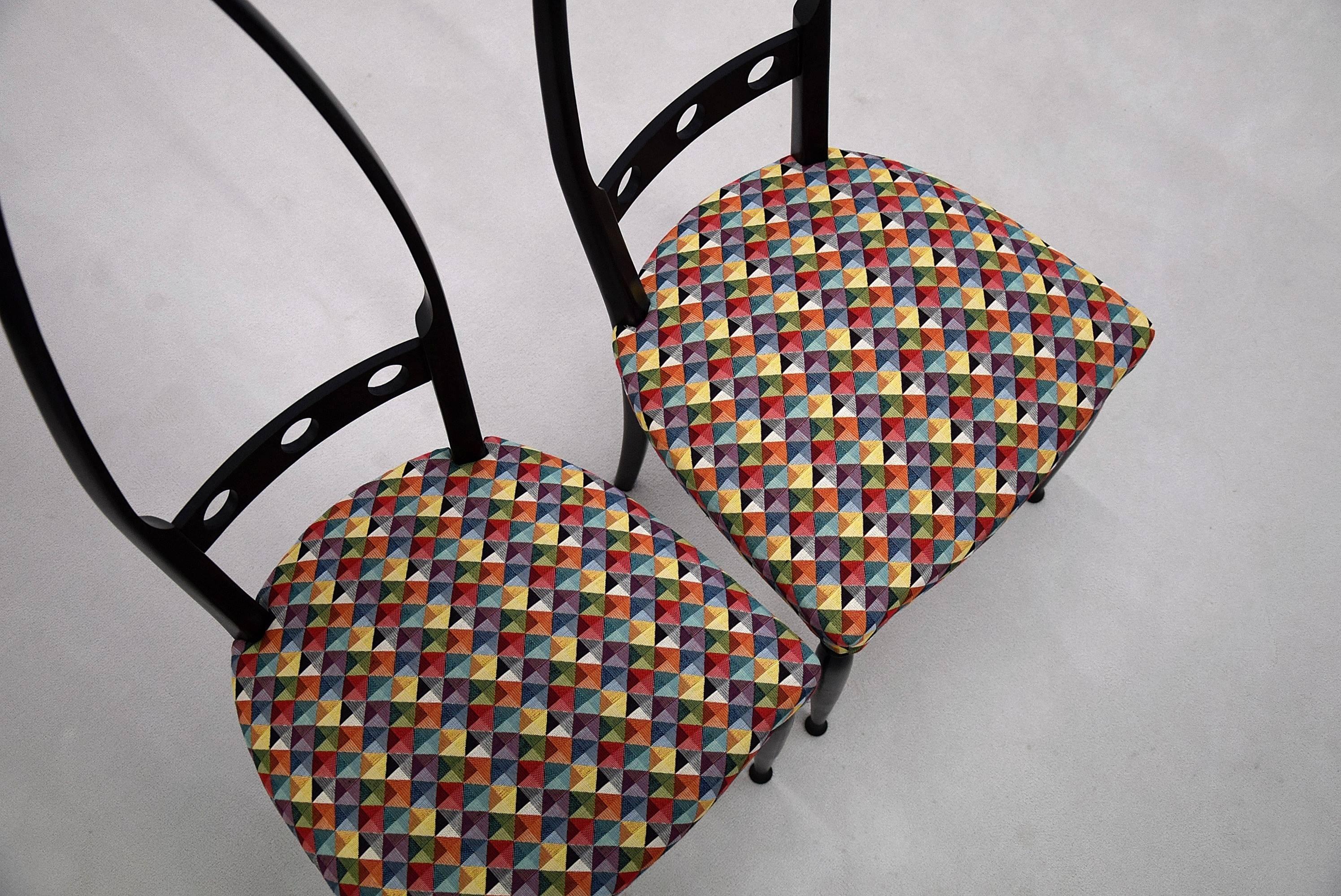 Pozzi and Verga mid century modern chairs.
Beautiful sculptural black lacquered Mid-Century chairs by Pozzi e Verga, Italy.
The chairs are in great condition and have been reupholstered in Italy by a true Artigiano with Missoni fabric which recalls