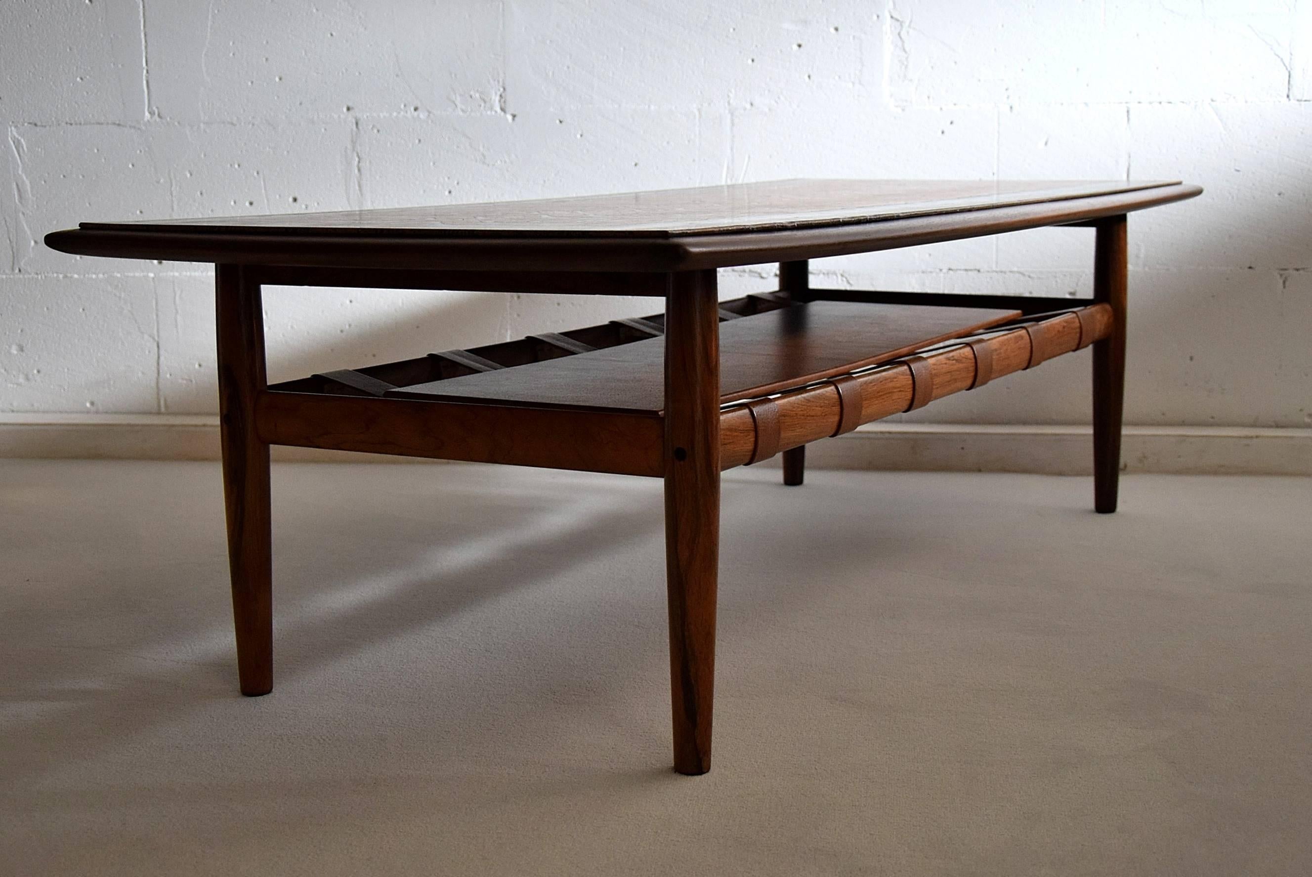Jatoba and brass Mid-Century coffee table.
Stylish and classy coffee table produced in northern Italy in 1969 on commission. This rare beauty, in great condition, could very well be a one of a kind.

Measurements : L 150 x W 65 x H 43cm.

This table