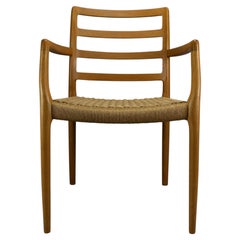 Poltrona Niels Otto Møller Modello 68 in rovere e cordoncino di carta, J.L. Møllers Møbelfabrik, 1
