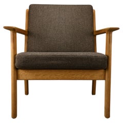 GE-265 solid Oak lounge chair by Hans J. Wegner for Getama, Denmark, Kvadrat woo