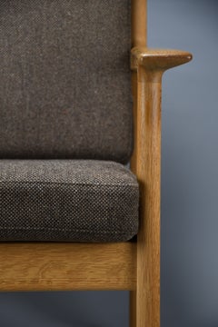 GE-265 solid Oak lounge chair by Hans J. Wegner for Getama, Denmark, Kvadrat woo