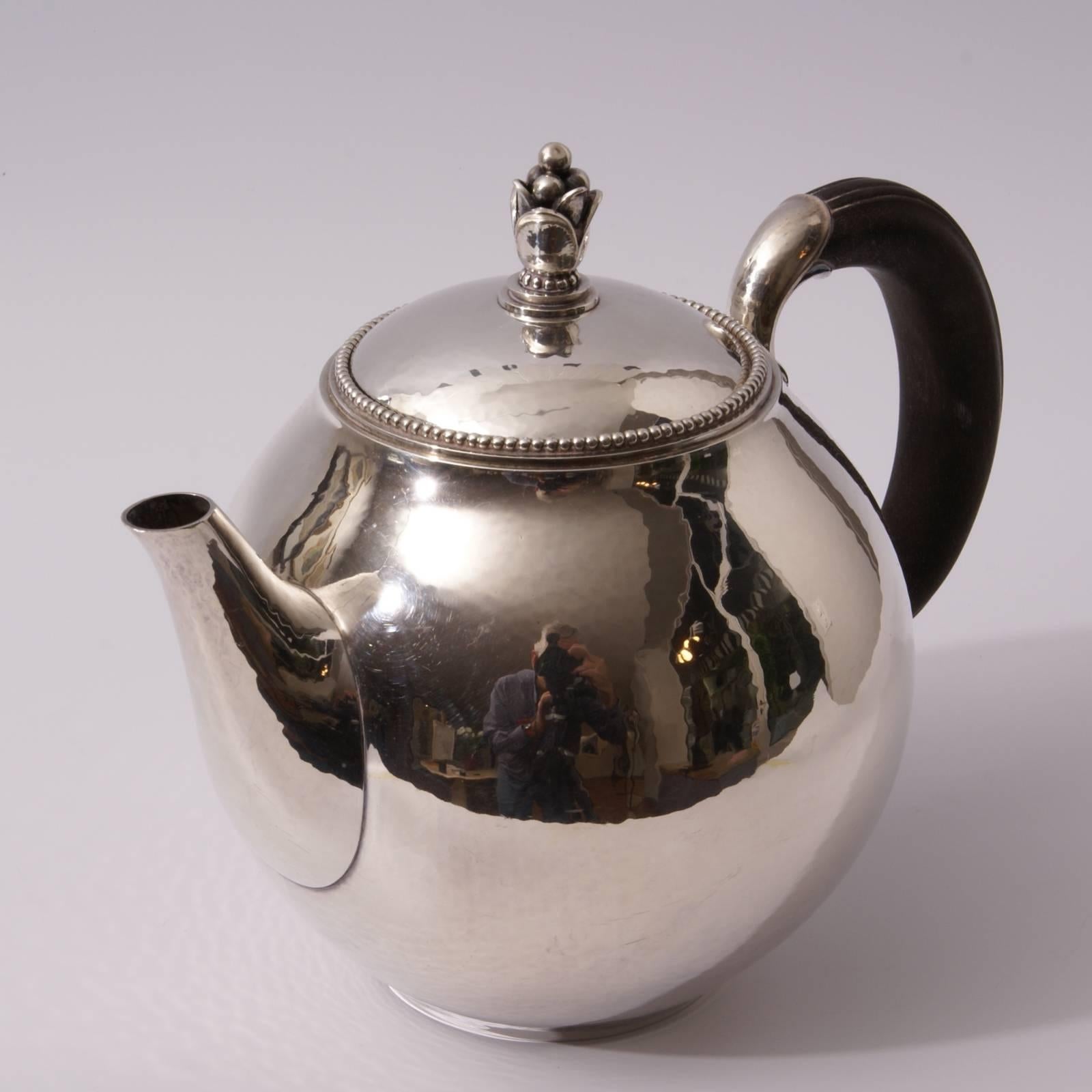 Sterling silver and wood teapot model 456 B designed by Harald Nielsen for Georg Jensen