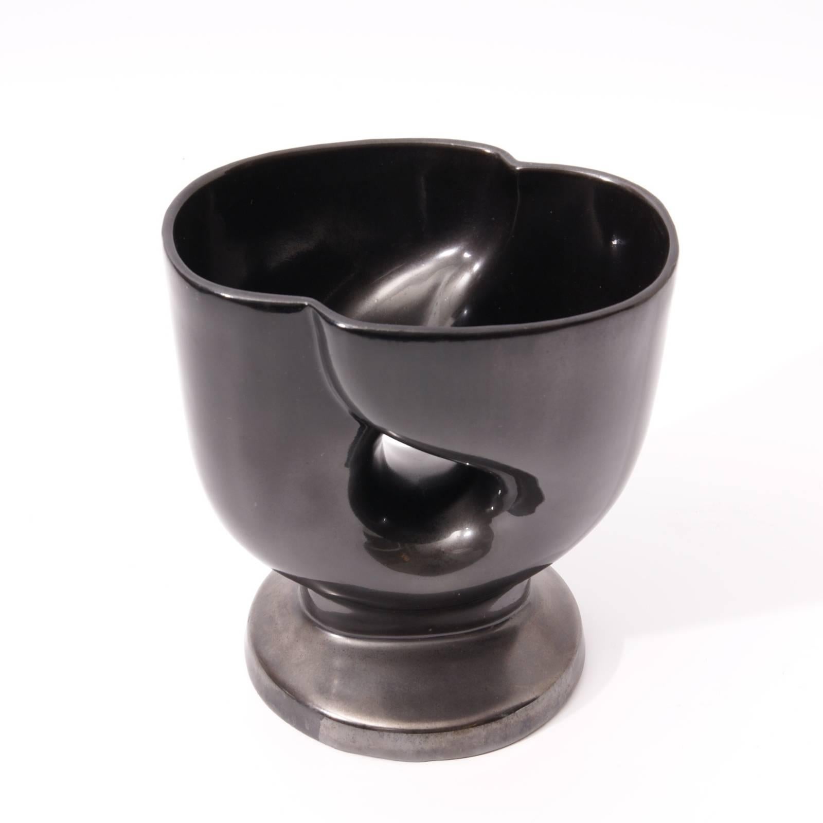 This earthenware vase entitled 