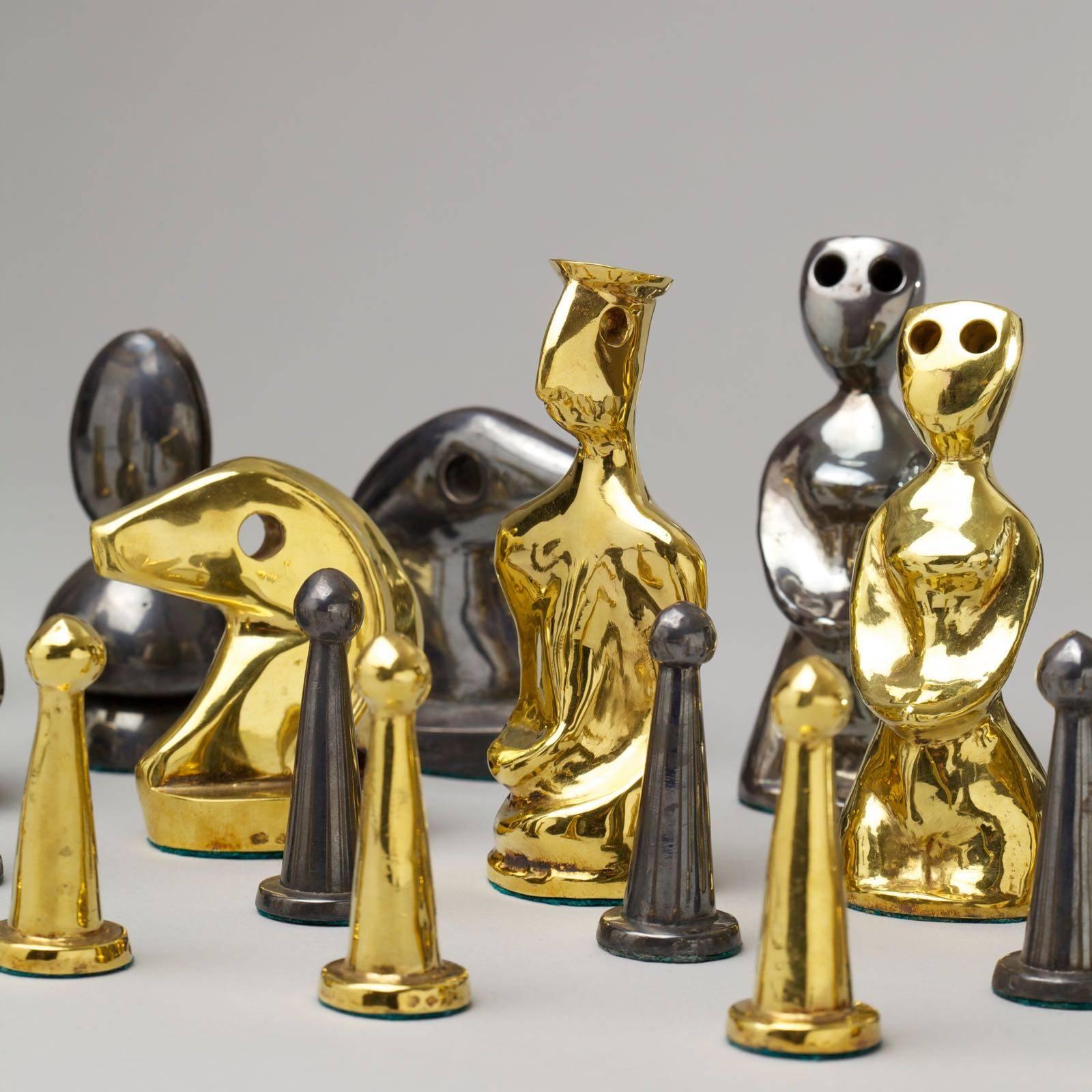 This chess set was designed by Max Ernst and executed by Pierre Hugo, goldsmith in Aix-en-Provence (France) in 23 carat gold and oxidized 990 silver. The gold weight 1051 grams and the silver weight 778 grams. Each piece was entirely made by hand.