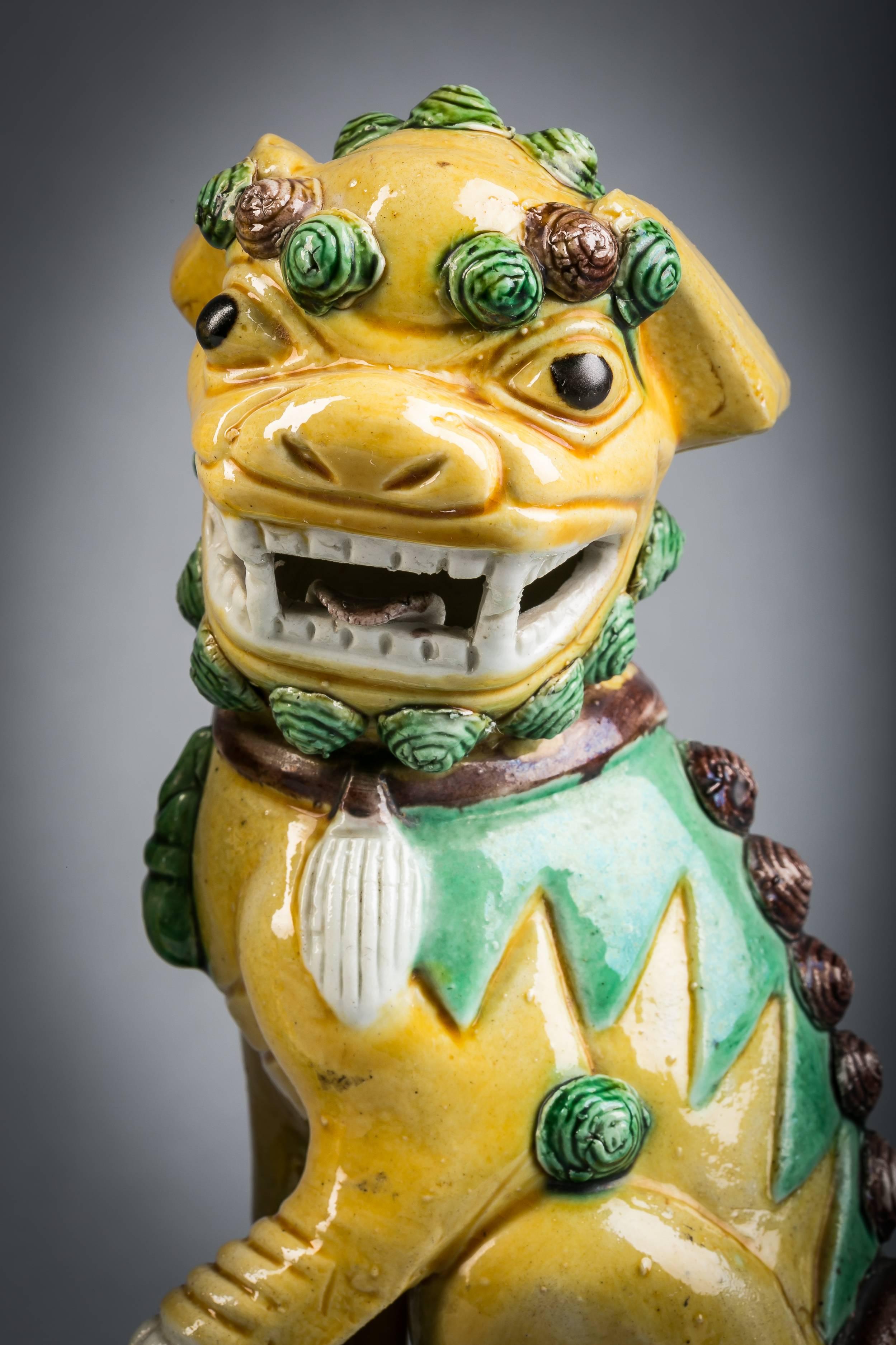 Pair of Chinese polychrome foo dogs, circa 1890.

