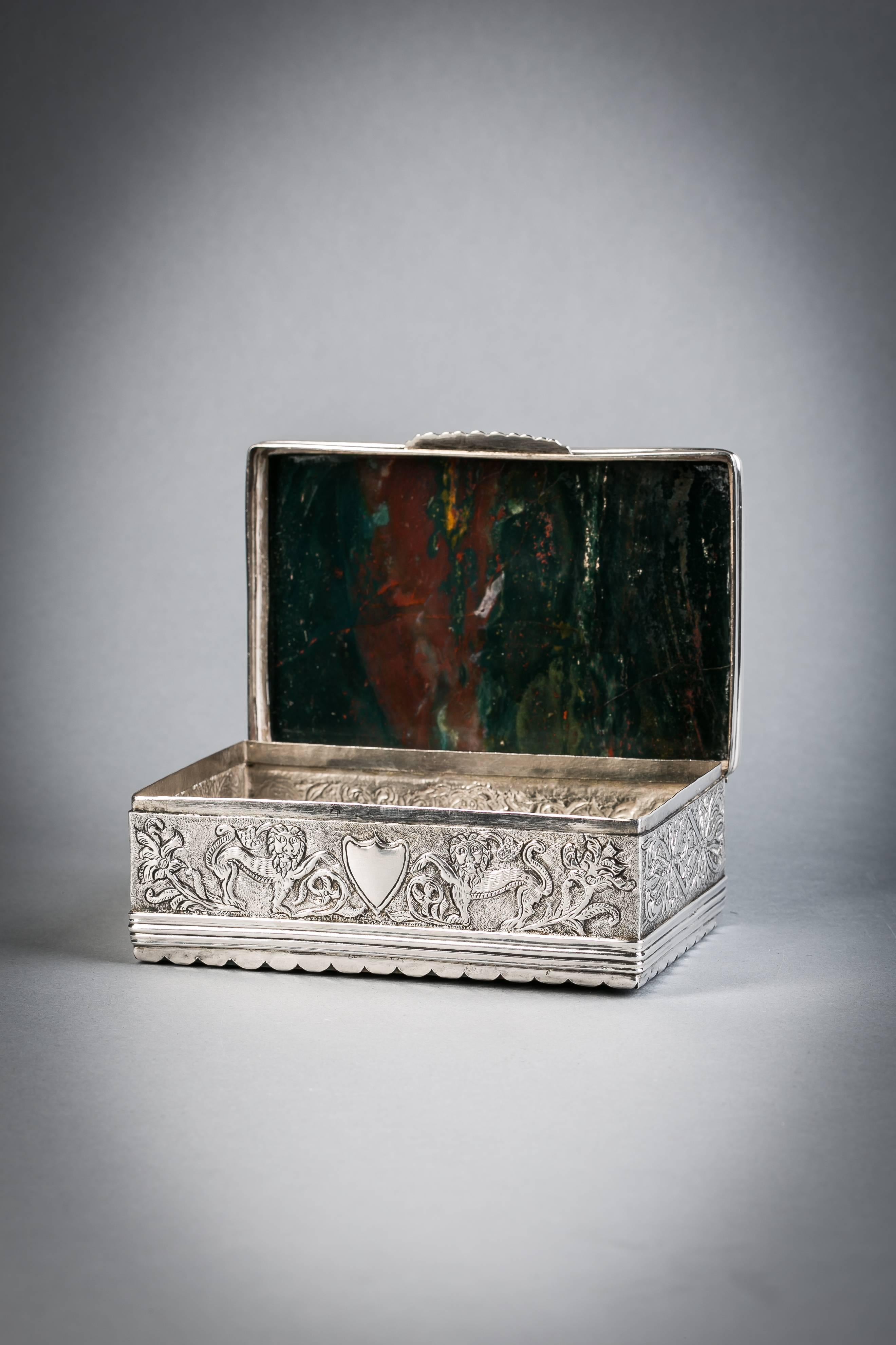 Continental silver and agate box, circa 1870.

With Agate on top and bottom. Silver apparently unmarked.