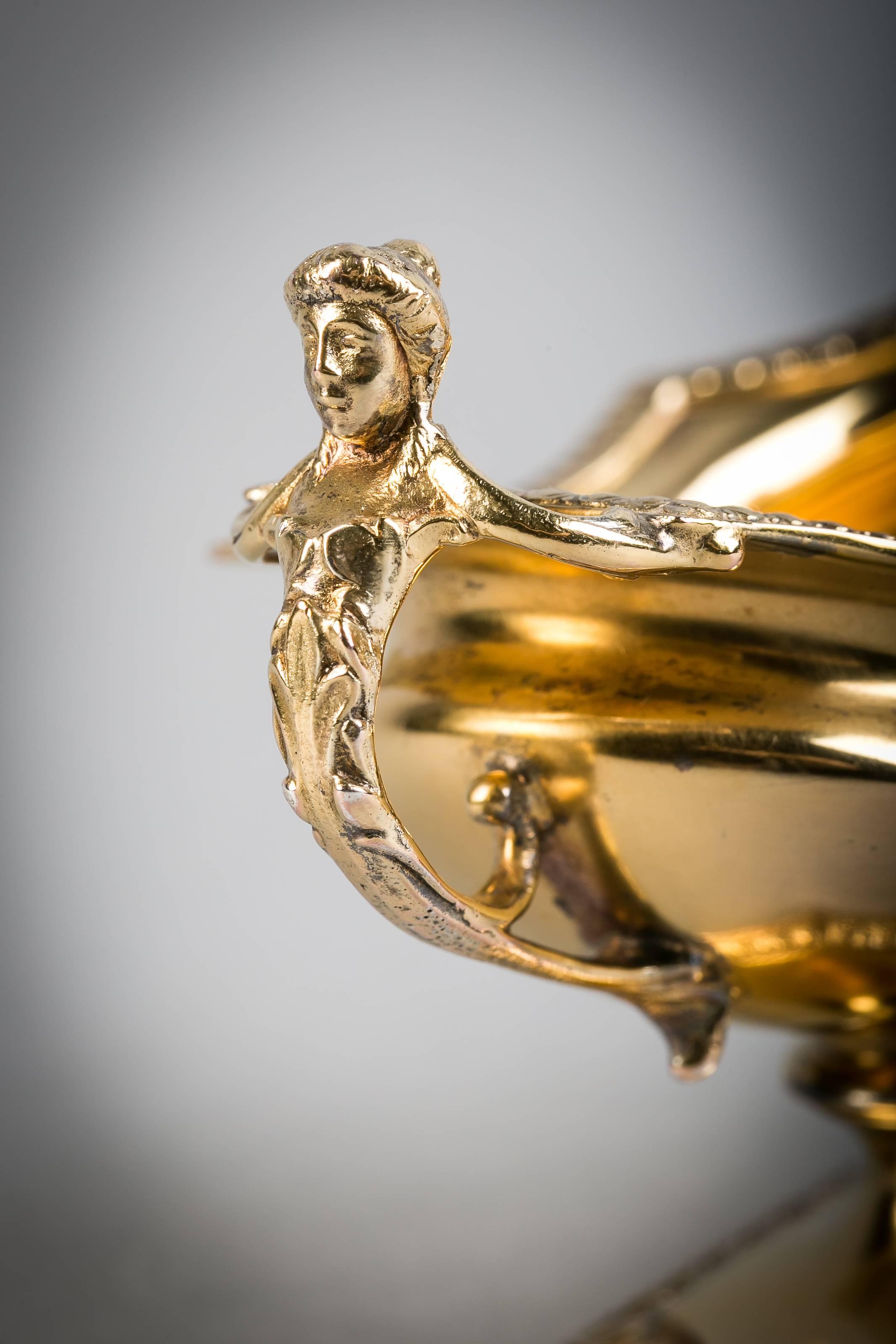 Coppia di saliere Gorham in argento dorato, inizio XX secolo.