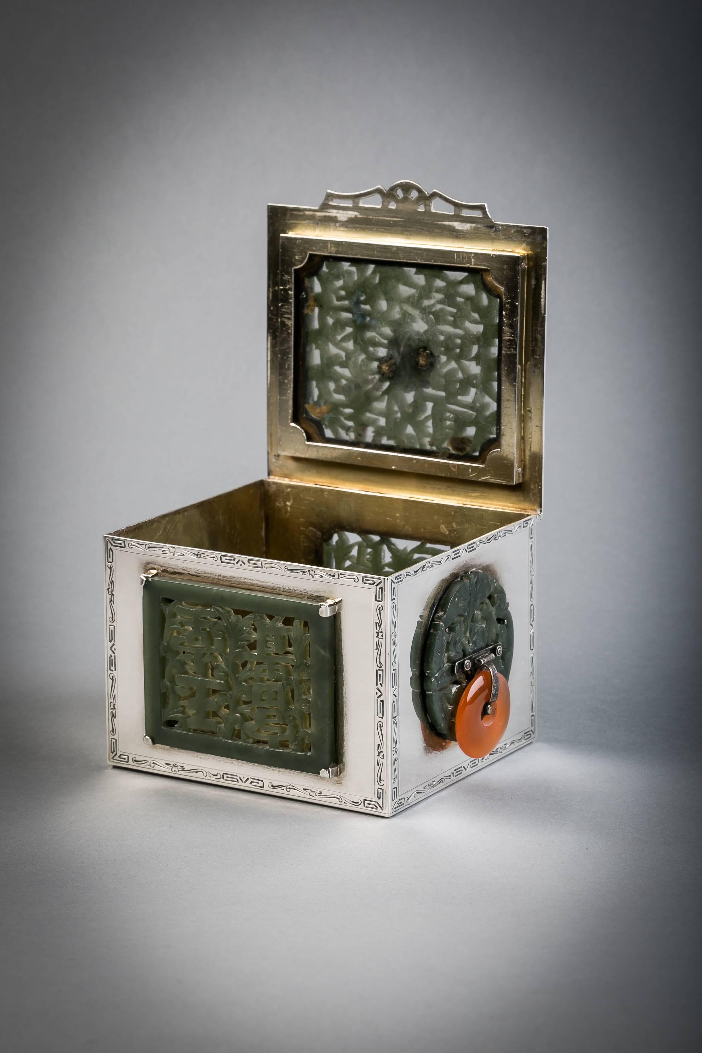 Sterling silver and jade box, Farmer, circa 1920.

Marked: Edward Farmer.