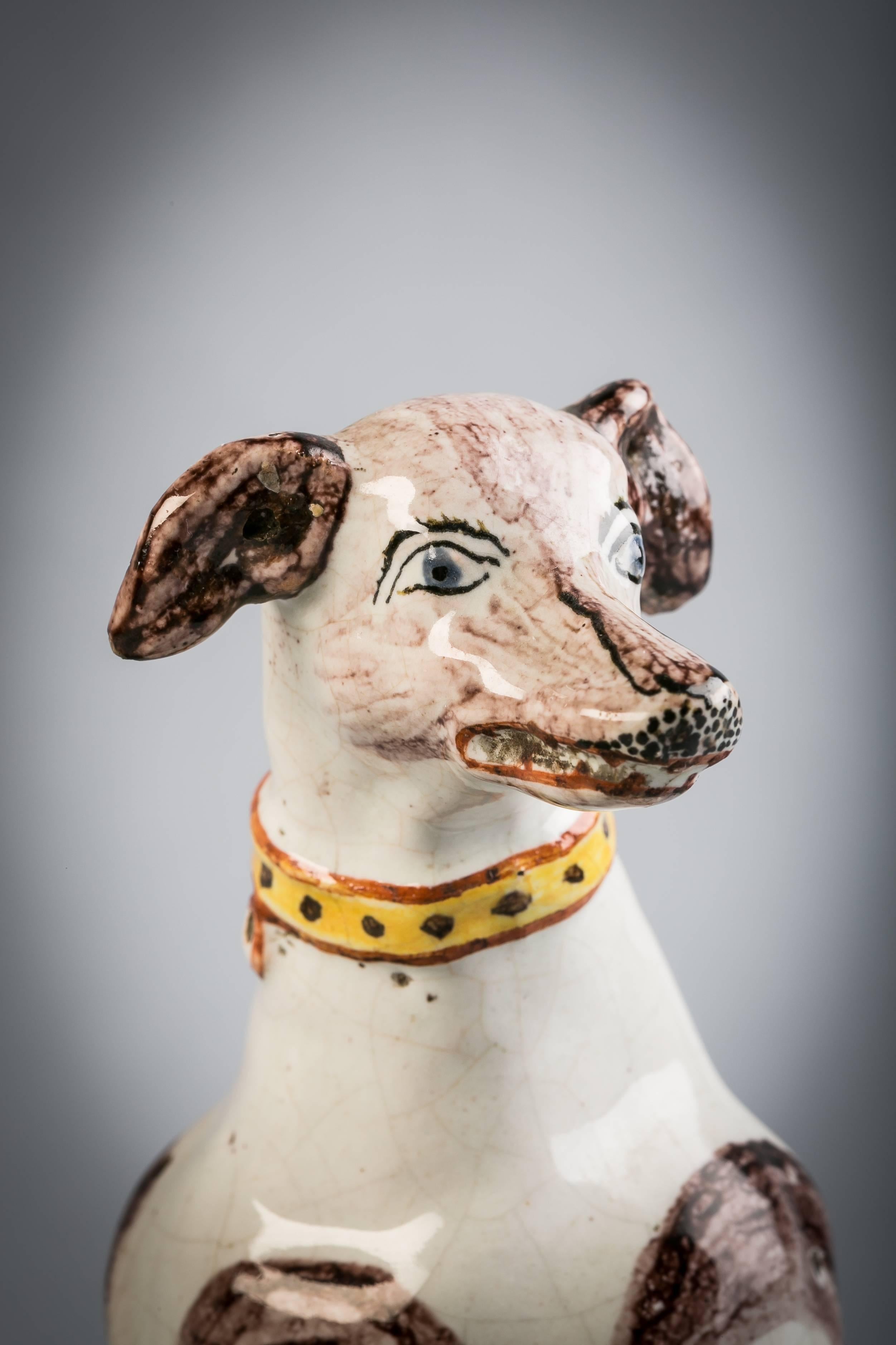 Pair of Continental faience dogs, Belgian, circa 1785.