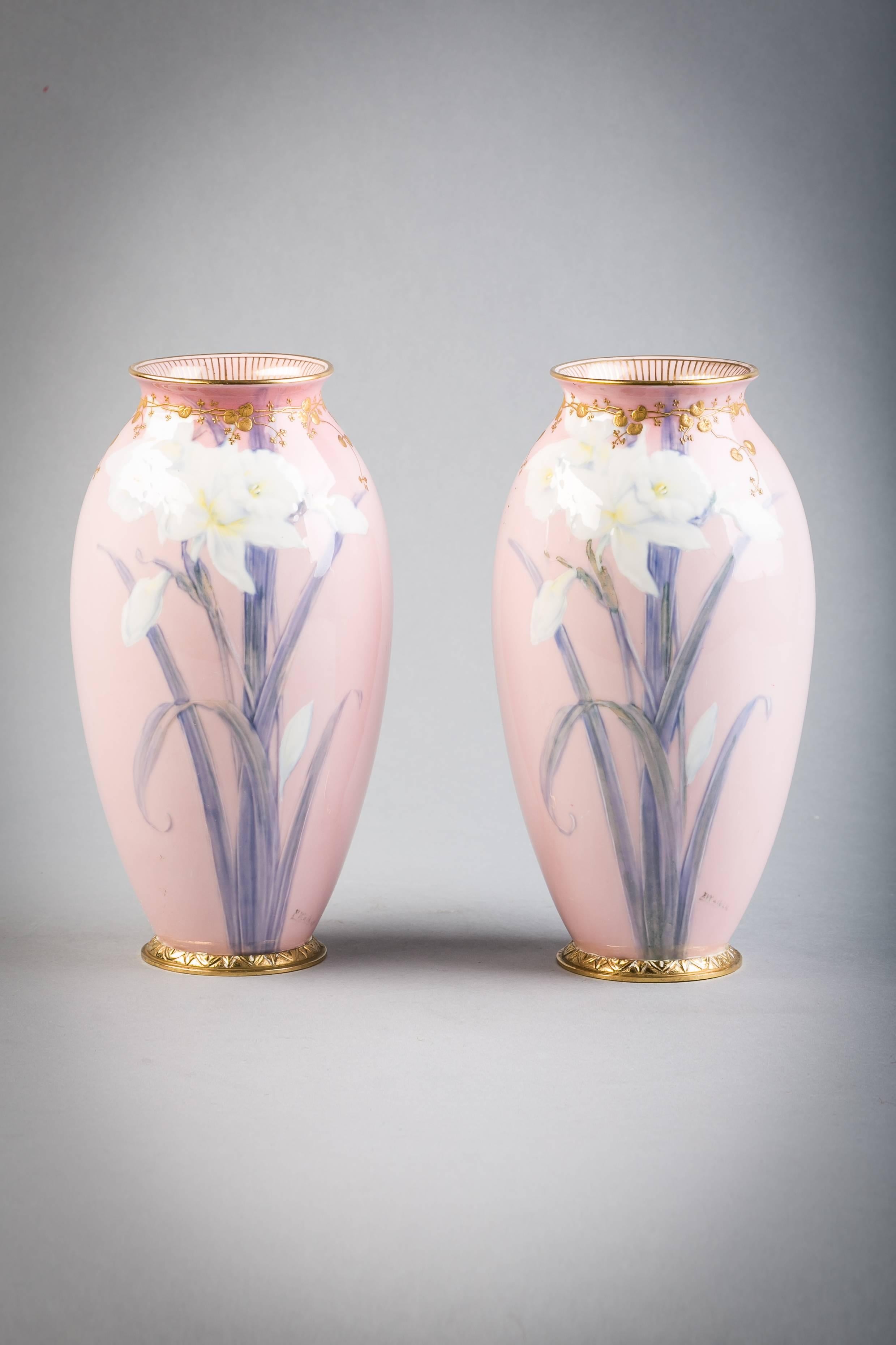 Pair of English porcelain gilt bronze-mounted pate-sur-pate vases, Doulton Burslem, circa 1900.

Signed.