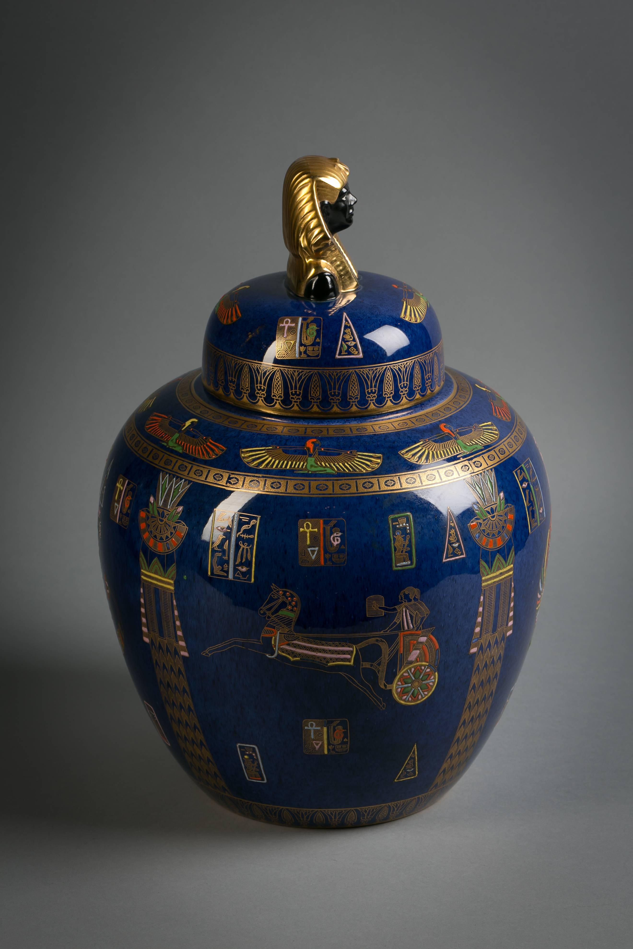 Enameled and gilt with Egyptian motifs. Printed marks in black and gilt.