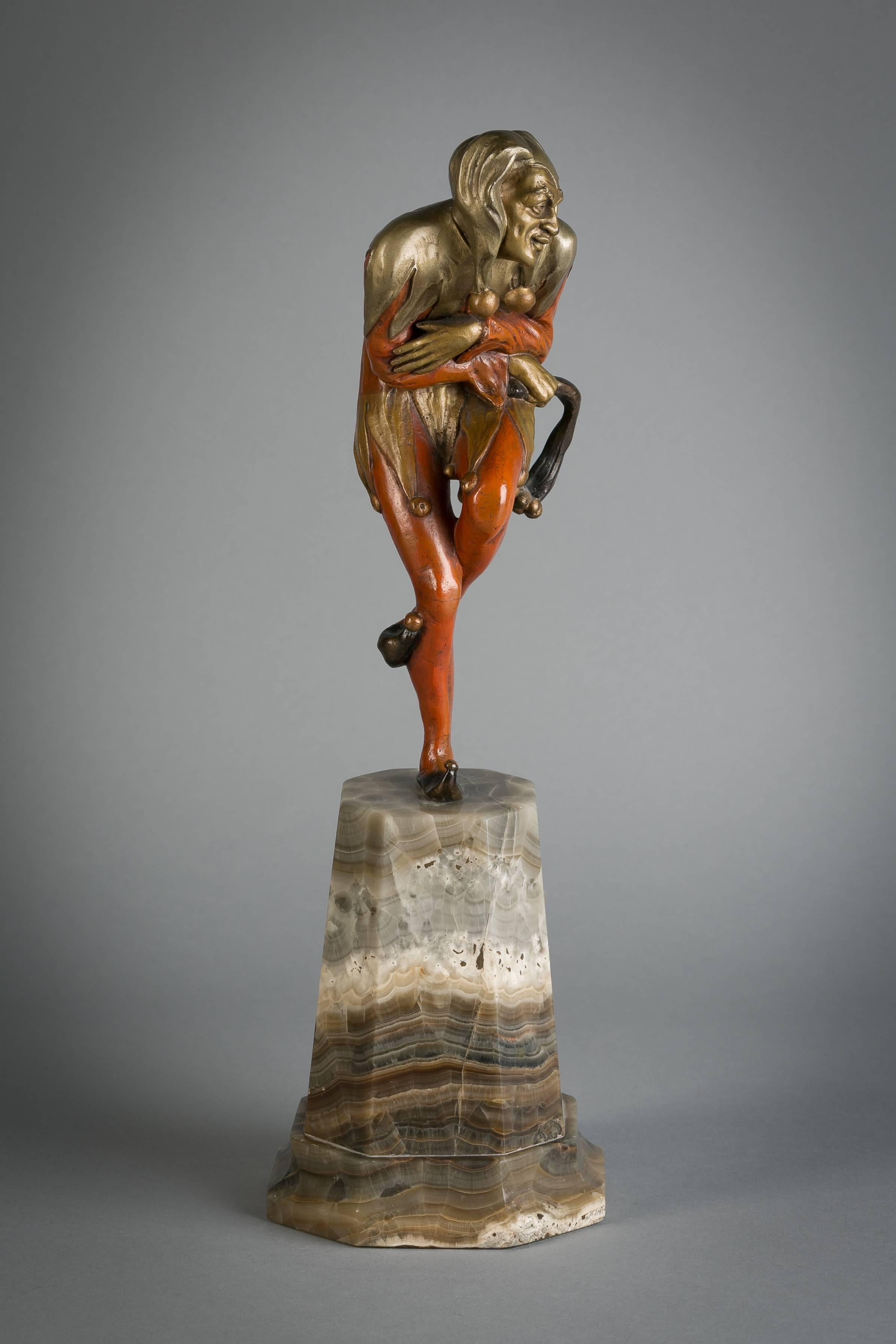 Vienna polychrome bronze jester on onyx stand, circa 1900.