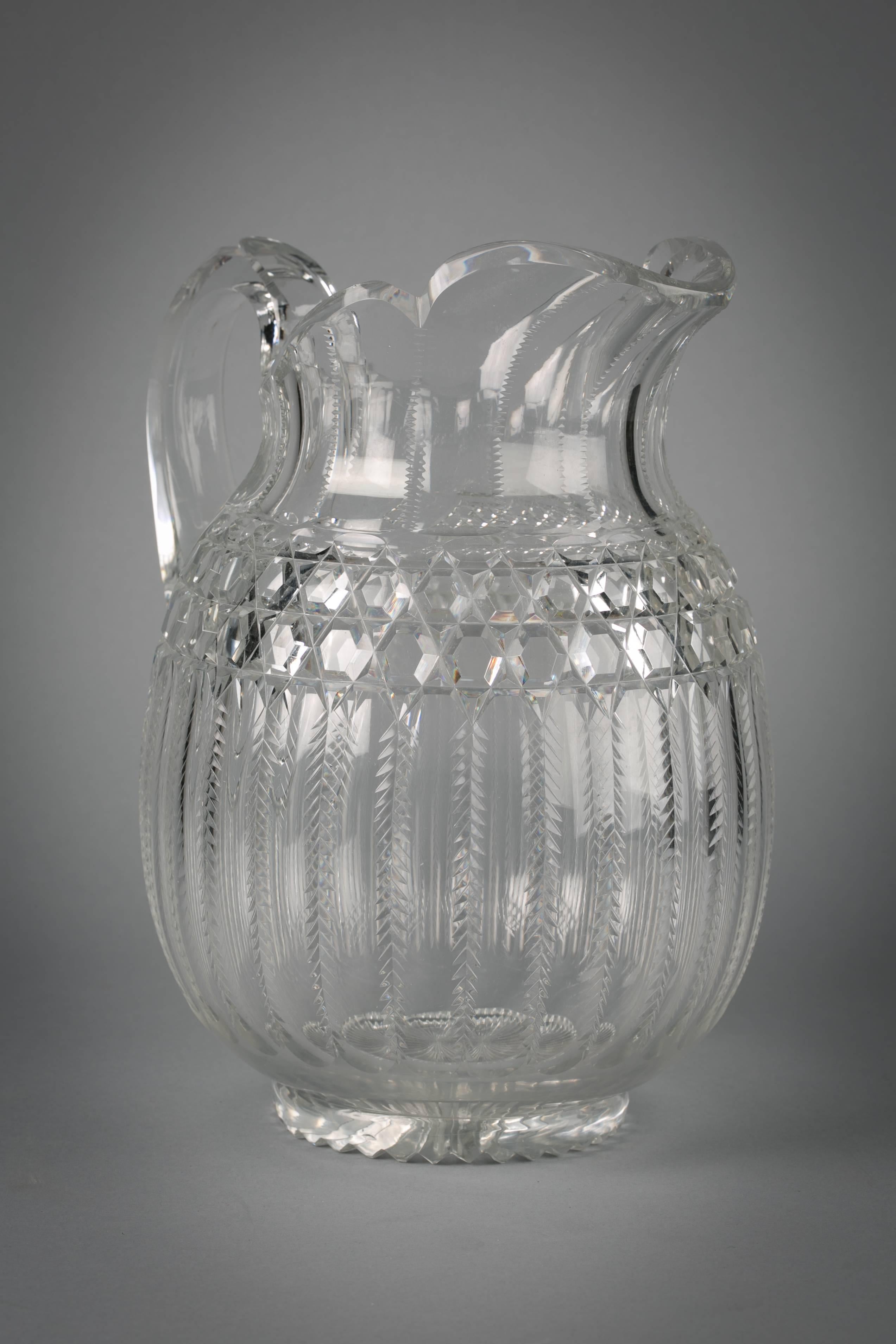 Large American faceted glass pitcher, circa 1900.