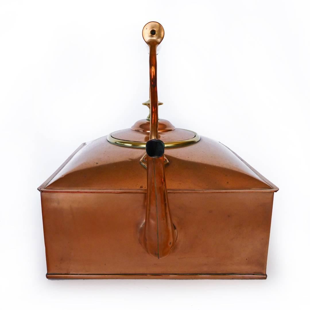 Rare English copper ship’s kettle.
Not dovetailed. Crimped seams, circa 1875.
Measures: 10 1/2” square.
13 3/8” long.
11 1/2” tall.