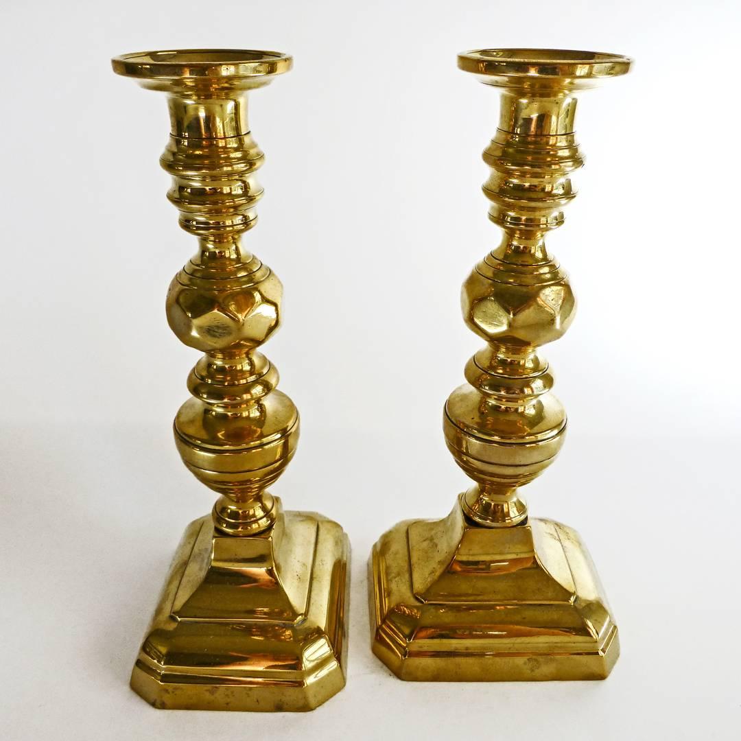 Pair of English brass candlesticks, circa 1840.
Very nice pair of beehive and diamond candlesticks with “Push Ups” for removing the candle wax.
Excellent condition.
Measures: Height 10”, base 4 5/8” by 3 3/4”.