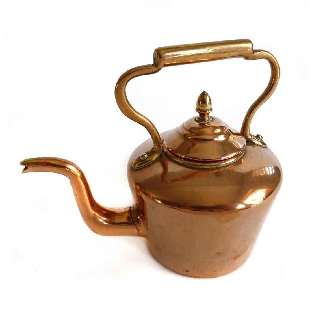 Victorian English miniature copper kettle,
circa 1875. Acorn finial.
Measures: 4 1/2” wide 4” tall dob 2 1/4”.