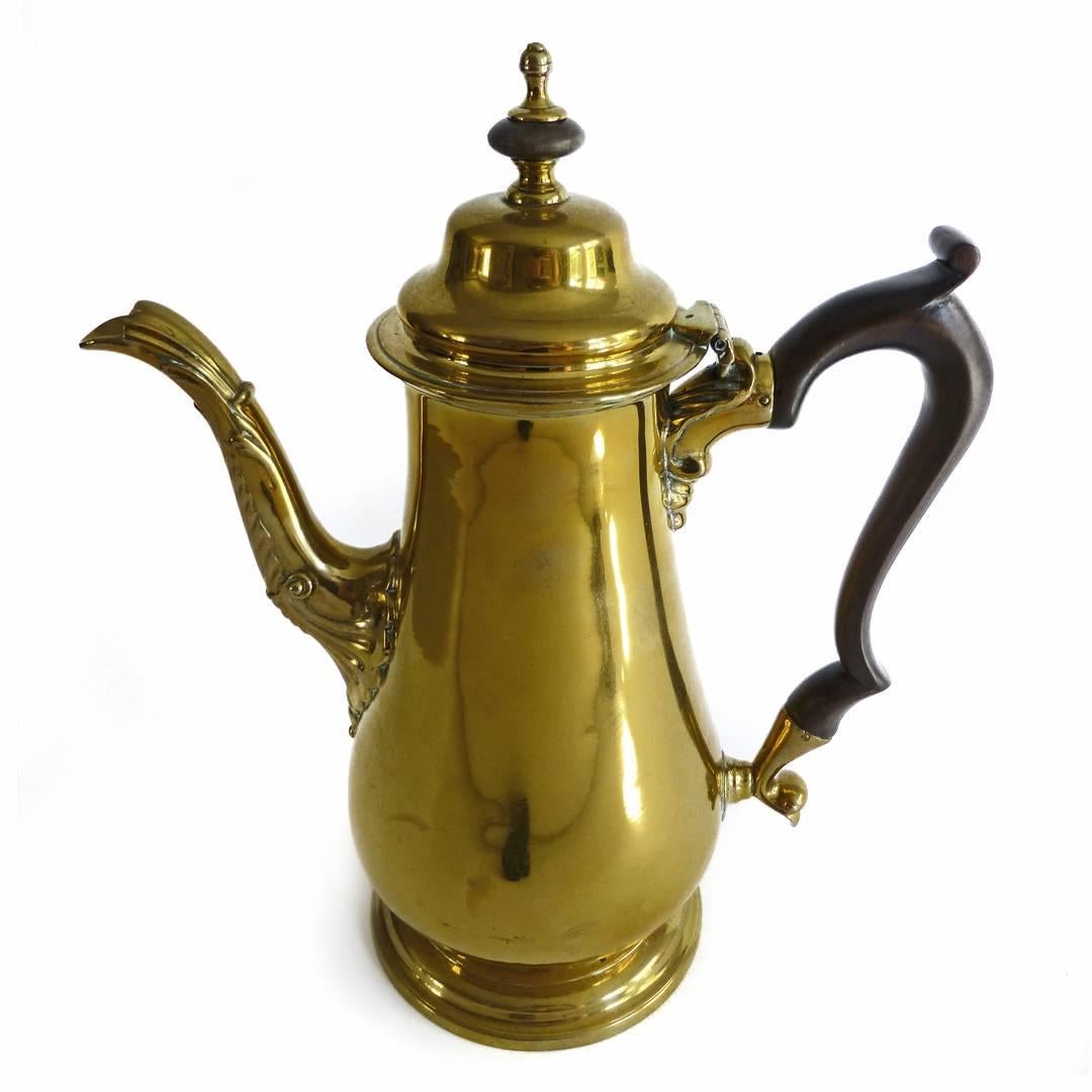 An exceptional brass “Silver Form” English coffee pot with Pseudo Marks.

By Josiah Daniel [Known Maker of French plate English brass. See Article by Peter Cameron, “Identifying ID With A Crown Above.” Journal of the Antique Metalware Society.