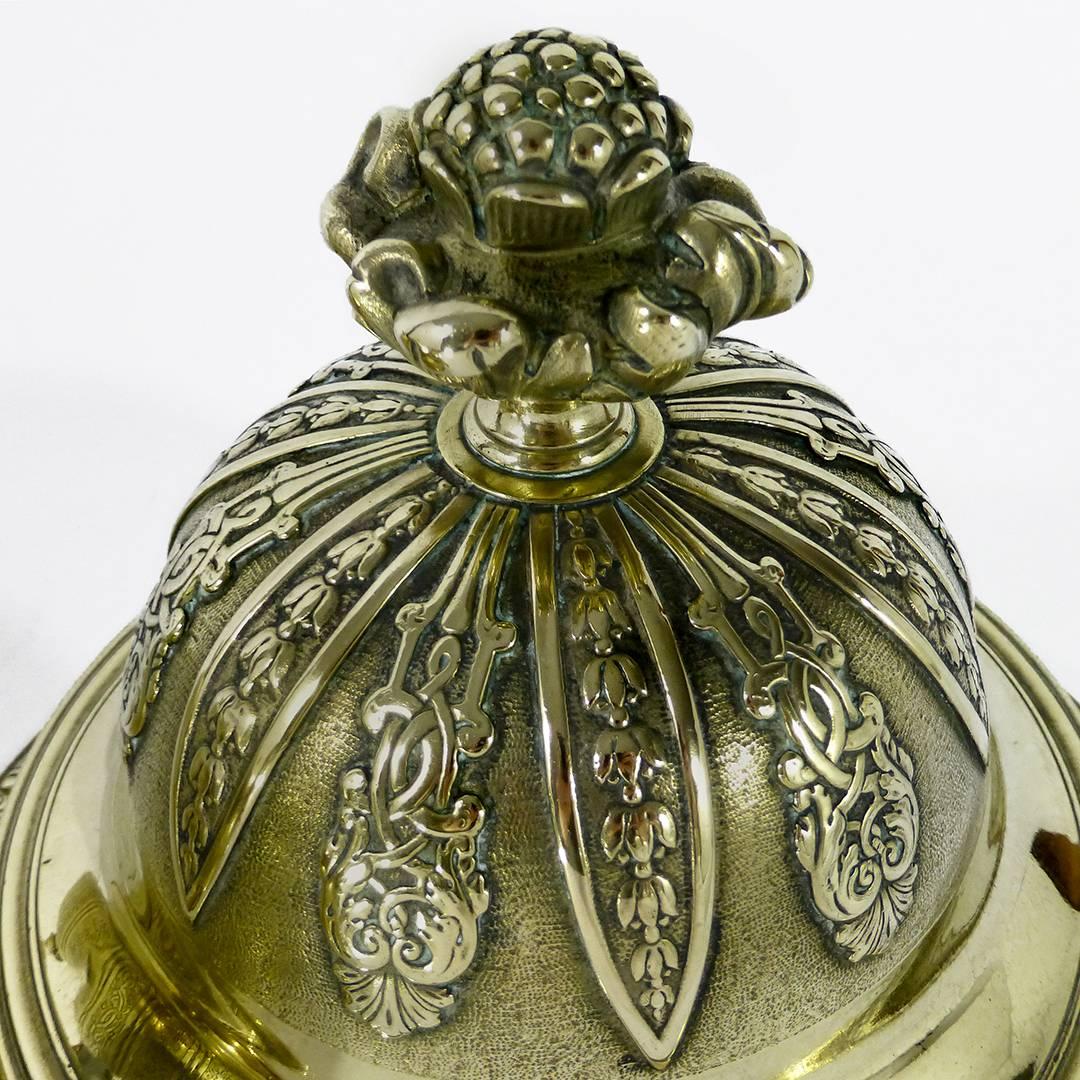 Important French Huguenot cast brass silver form tureen on three hairy paw feet. With strap work and cut card decoration to cover. Engraved panels all around base. Seamed foliate finial, circa 1720. Engraved with English ducal coronet