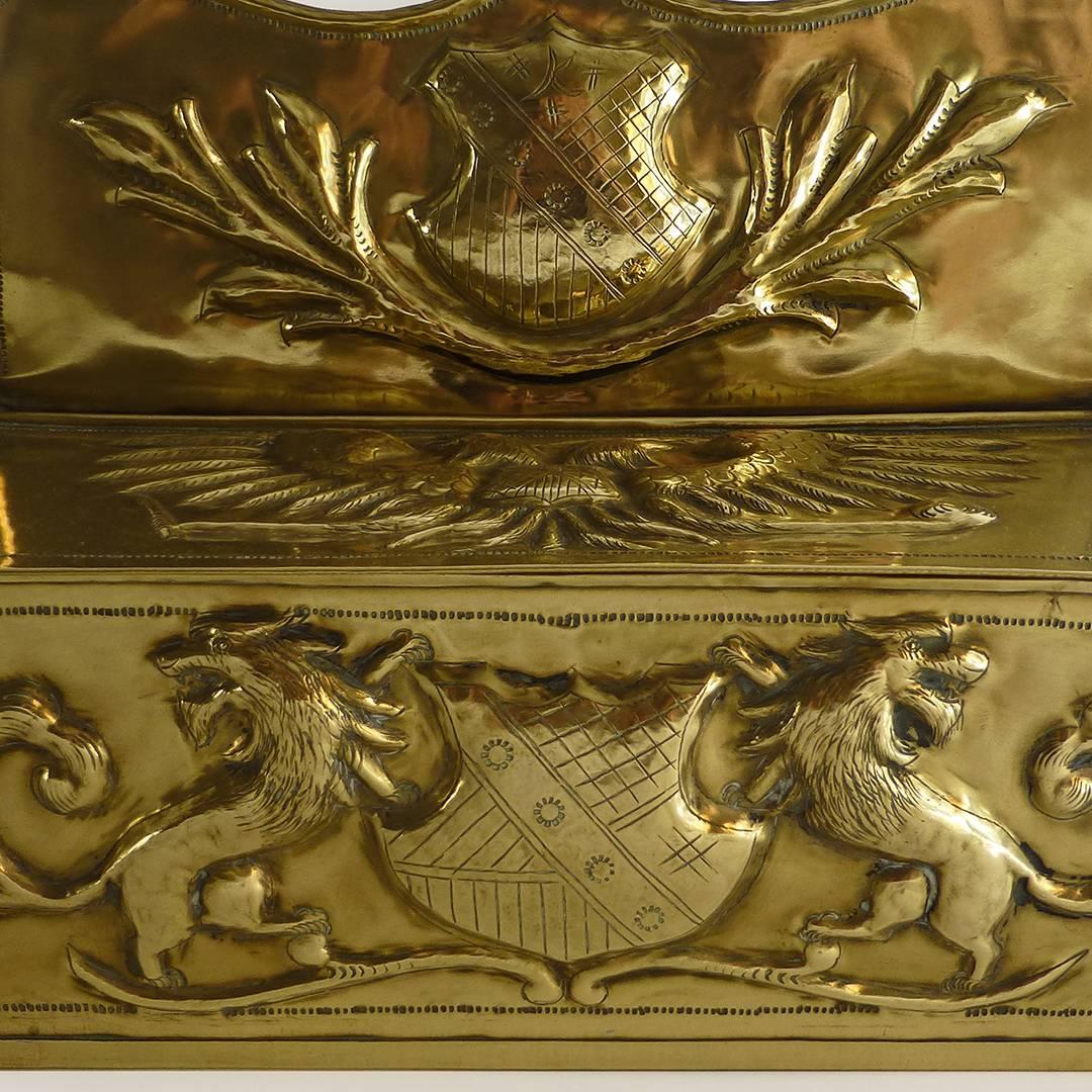 English / Dutch brass candle box, circa 1875. Decorated and fine original condition. Measures: Width 12 1/2″, depth 4 3/4″, height 9 3/8″.