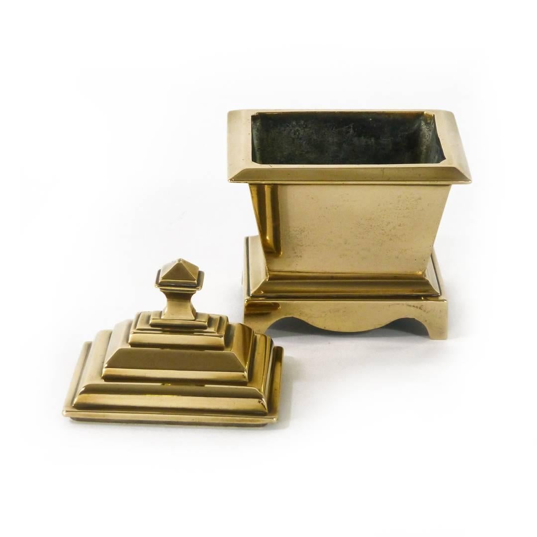 Cast English brass/bell metal casket tobacco box, circa 1875. Original fine condition. Measures: Height 6″, width 4 1/4″, depth 3 1/4″.