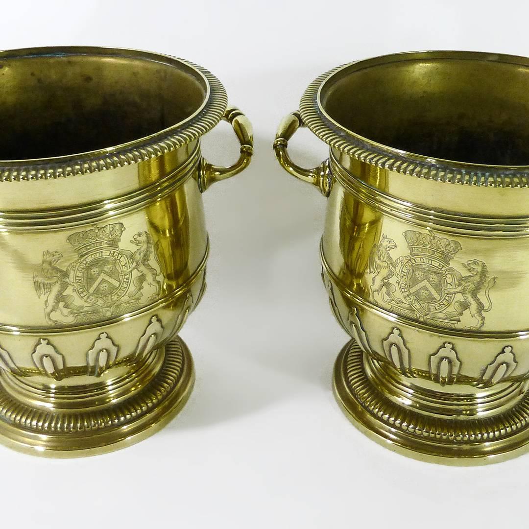 Pair of brass silver form huguenot wine buckets. (Paire de Rafraichissoirs), circa 1710.

Engraved with the arms of thomas wentworth, Lord Raby, 1st Earl of Strafford (1672-1739) British ambassador to Berlin and the Hague.

Cut card