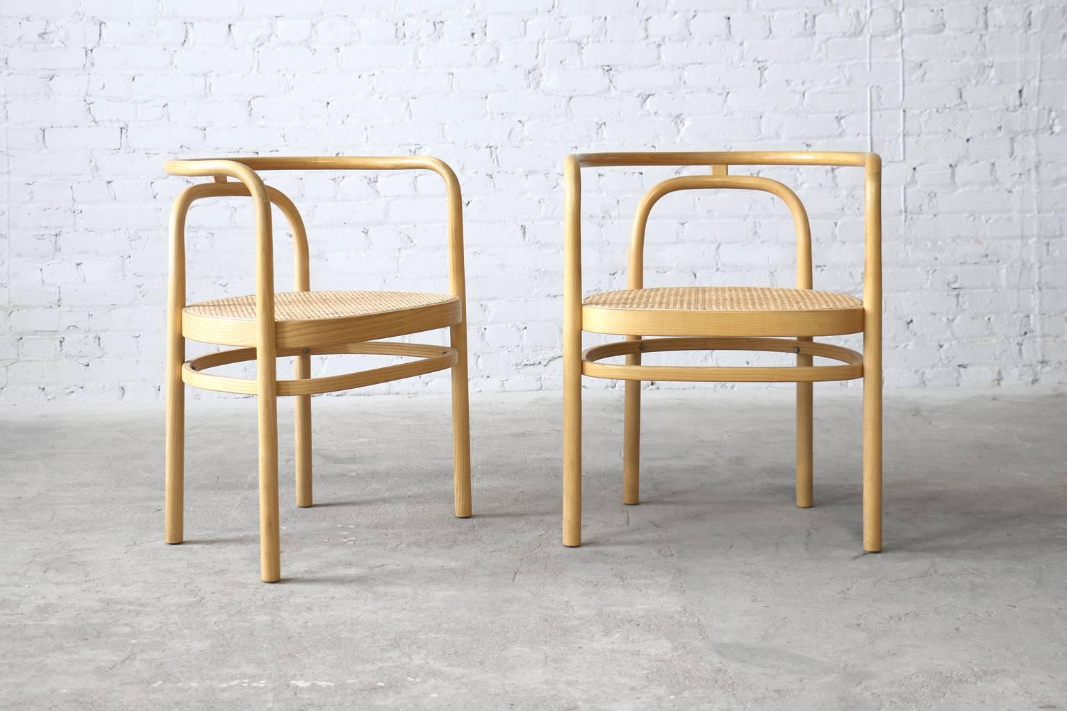 - model PK15
- designed in 1979
- steam-bent ash wood frame
- bamboo cane seat

A pair of bent ash wood armchairs by Poul Kjærholm for PP Møbler. One of Kjærholm's few wood chairs, it is based on the design of PK 12 steel chair. They work well
